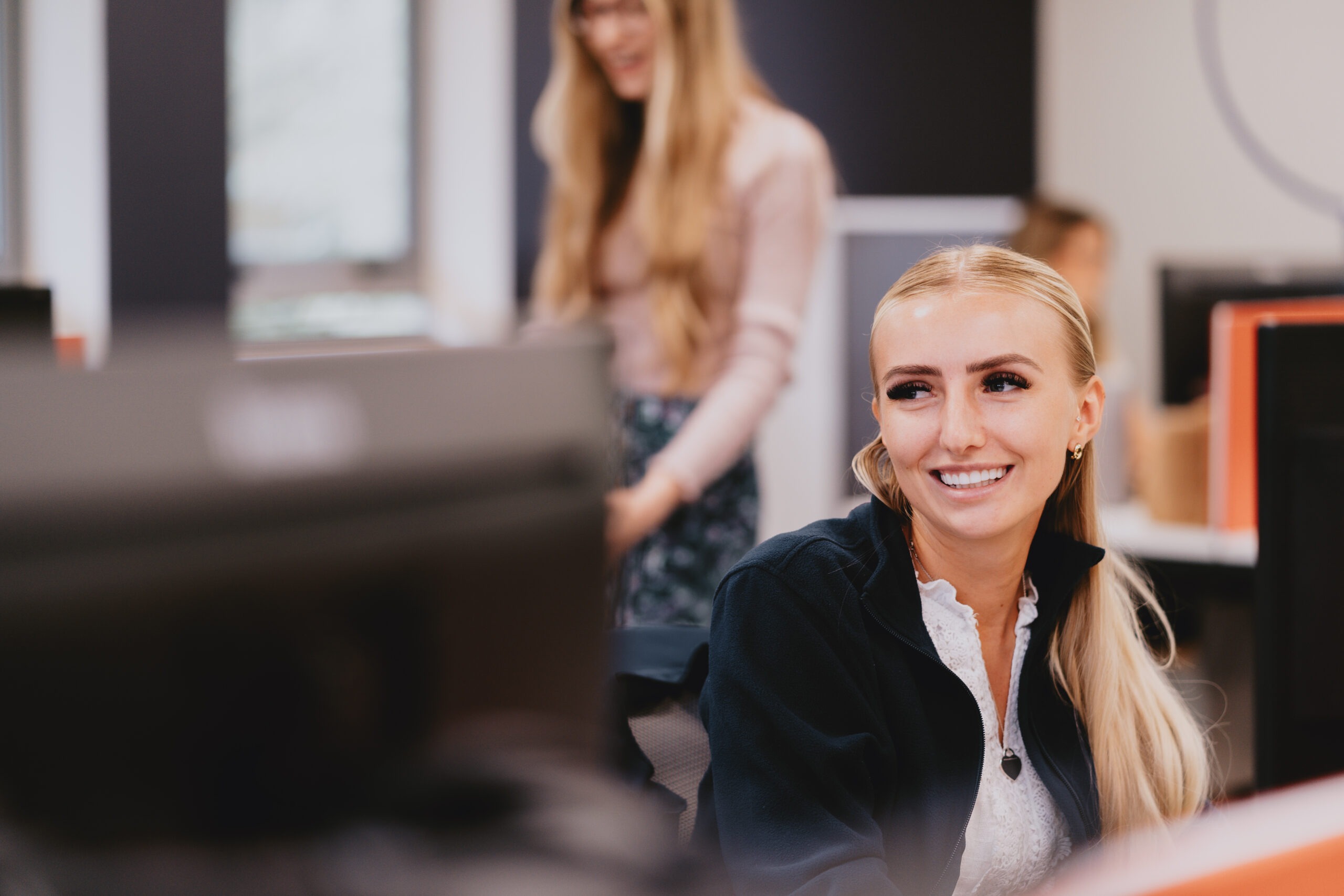 Nuvo team members collaborating in the office