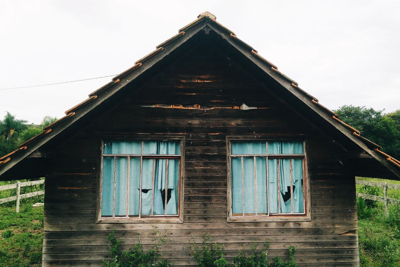 Weathered wooden house with worn exterior