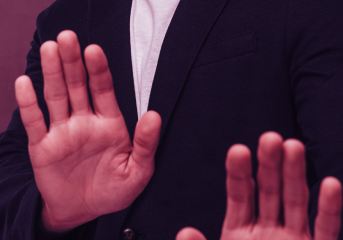 Man putting hands up defensively