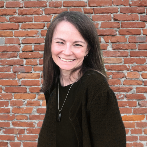 mother smiling while describing how a personalized song helped her daughter’s confidence