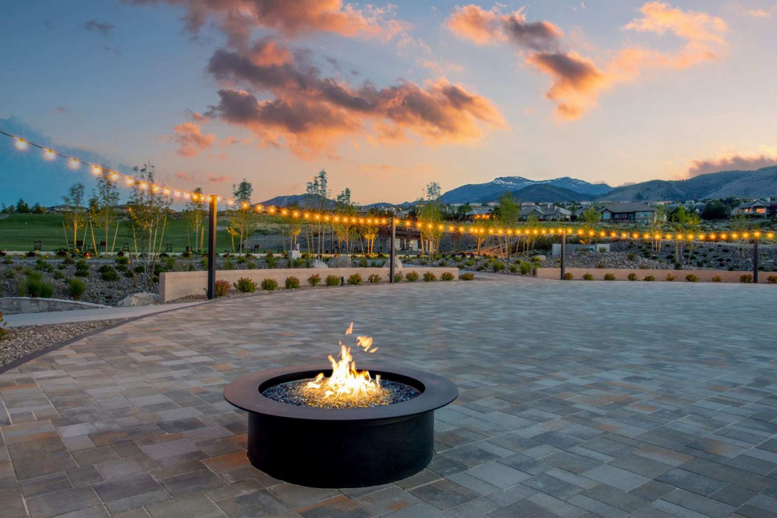 Evening firepit terrace at The Club at ArrowCreek
