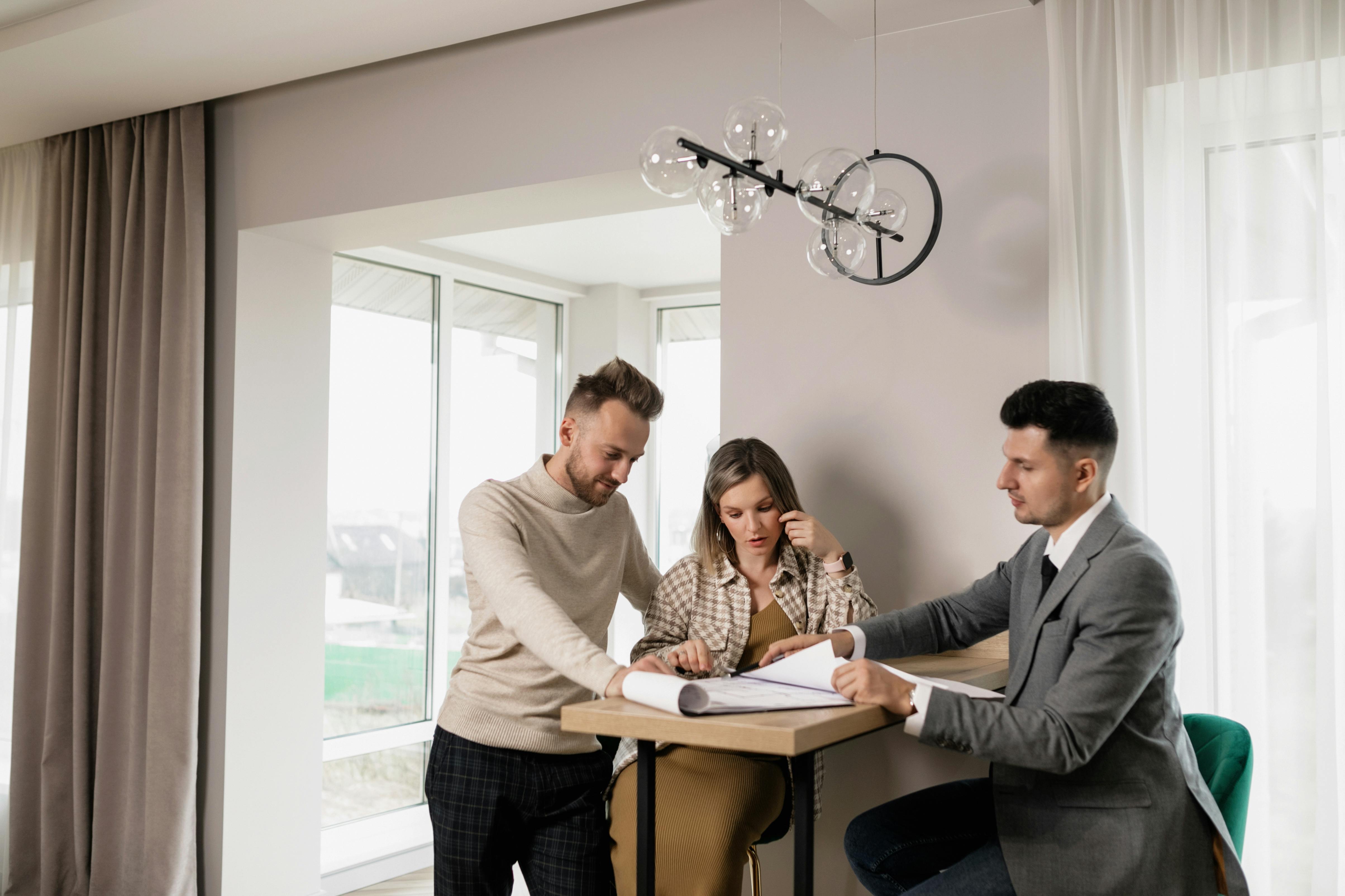 Seller and buyer discussing owner financing or lease-option terms for a home sale.