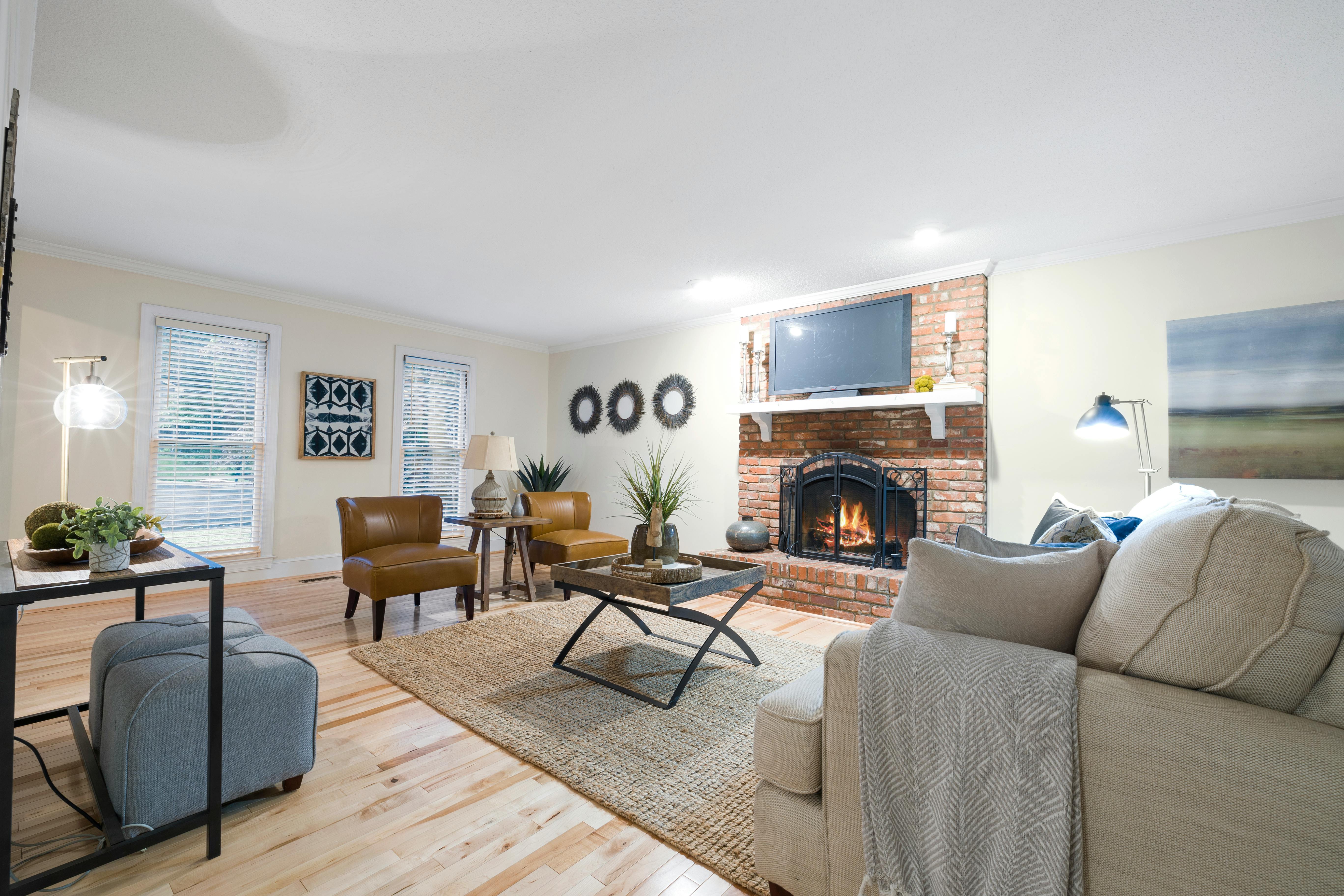 Neutral living room made memorable with one vintage staging piece.