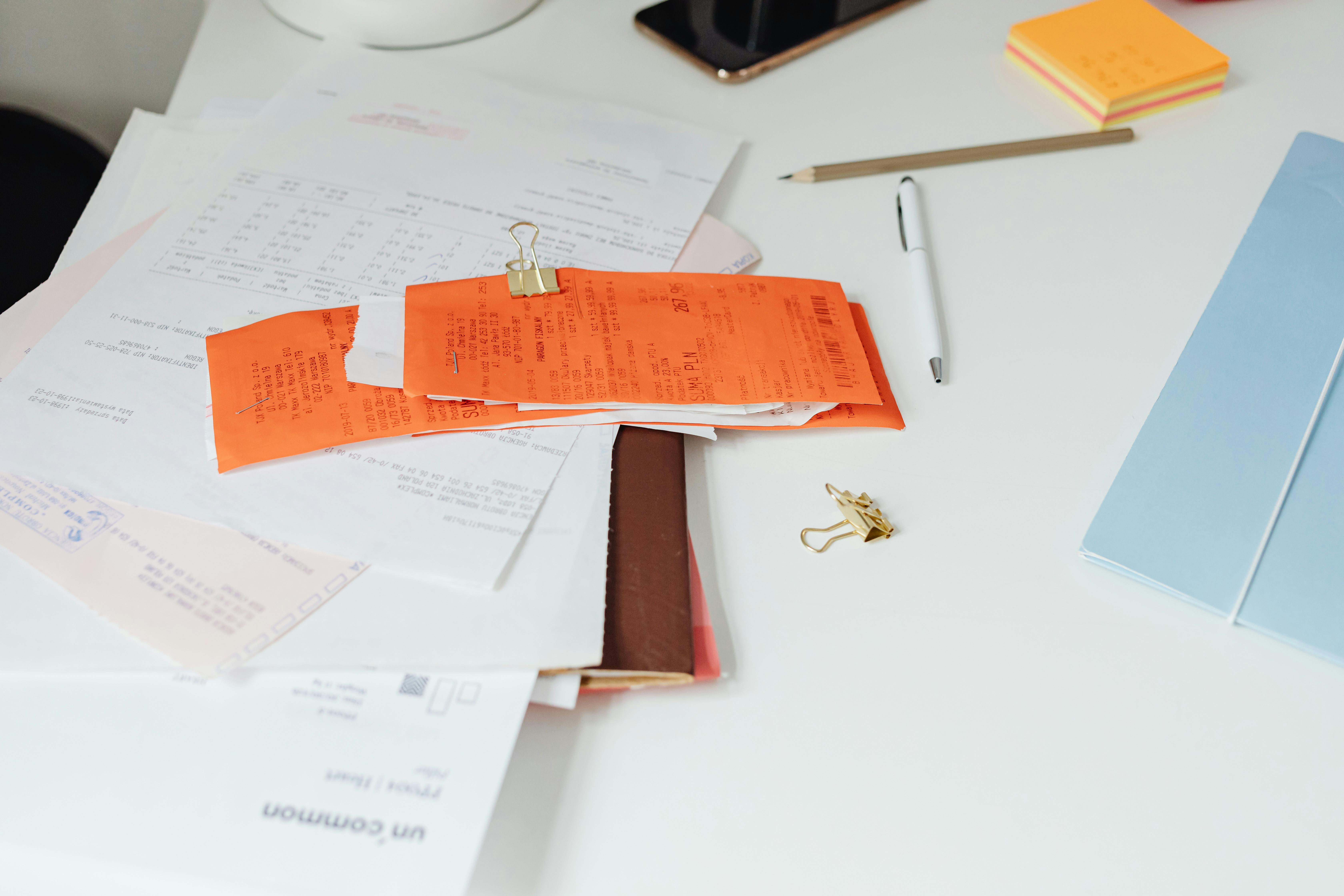 Organized truth binder with receipts, inspection report, and home records for an as-is sale.