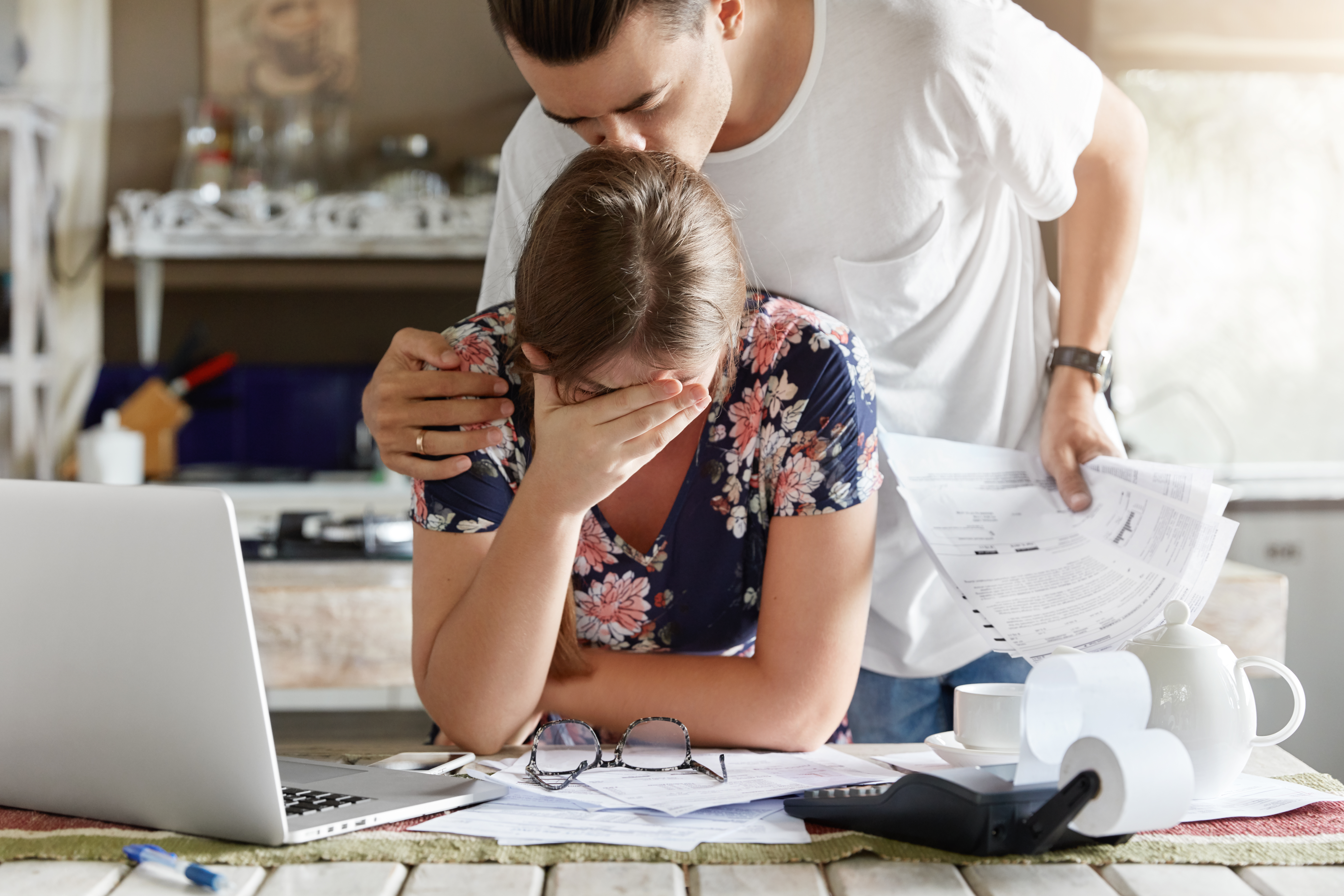 Seller reviewing multiple price reductions on a home listing. Seller reviewing multiple price reductions on a home listing.
