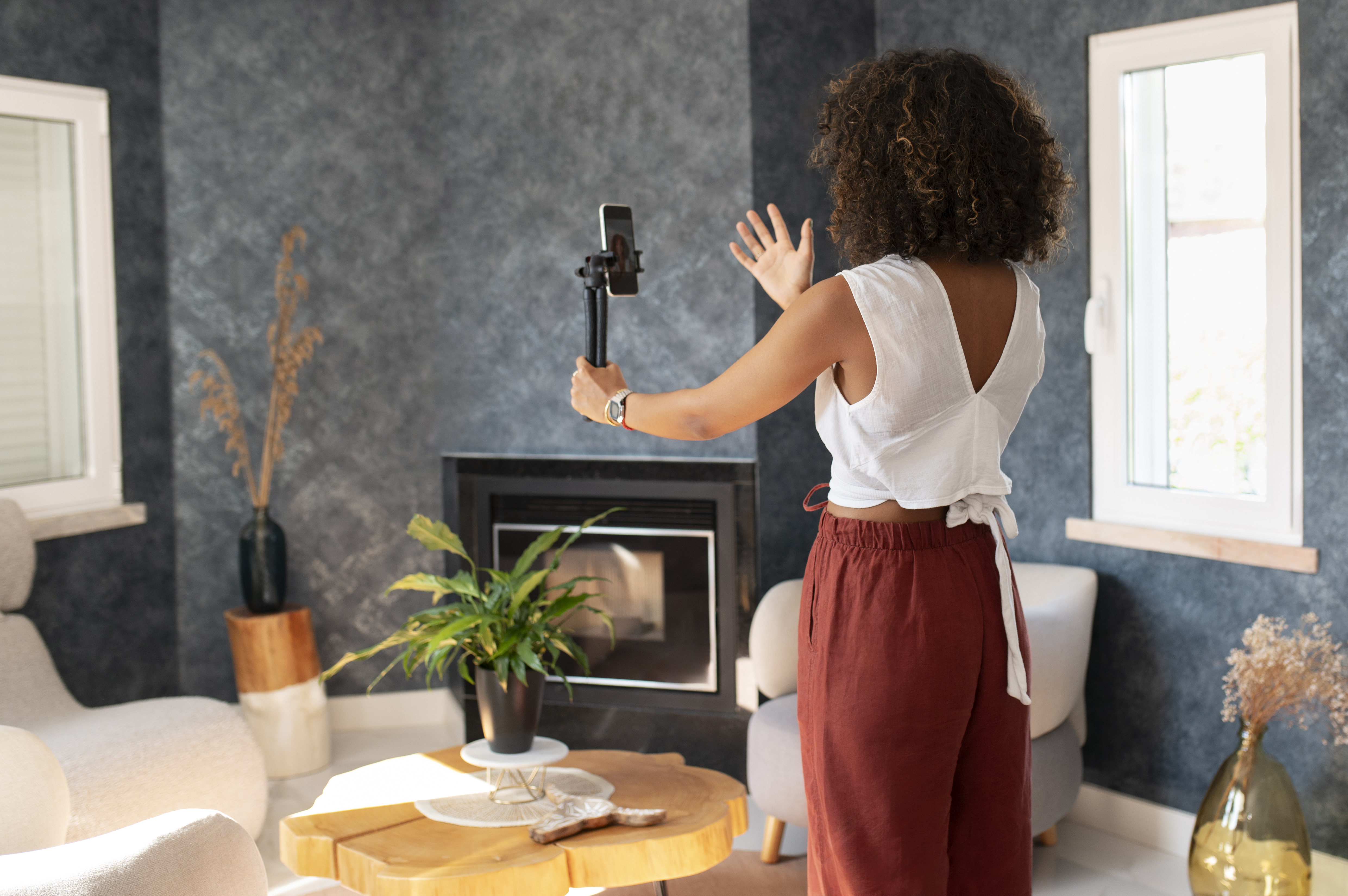 Seller documenting home condition before closing.