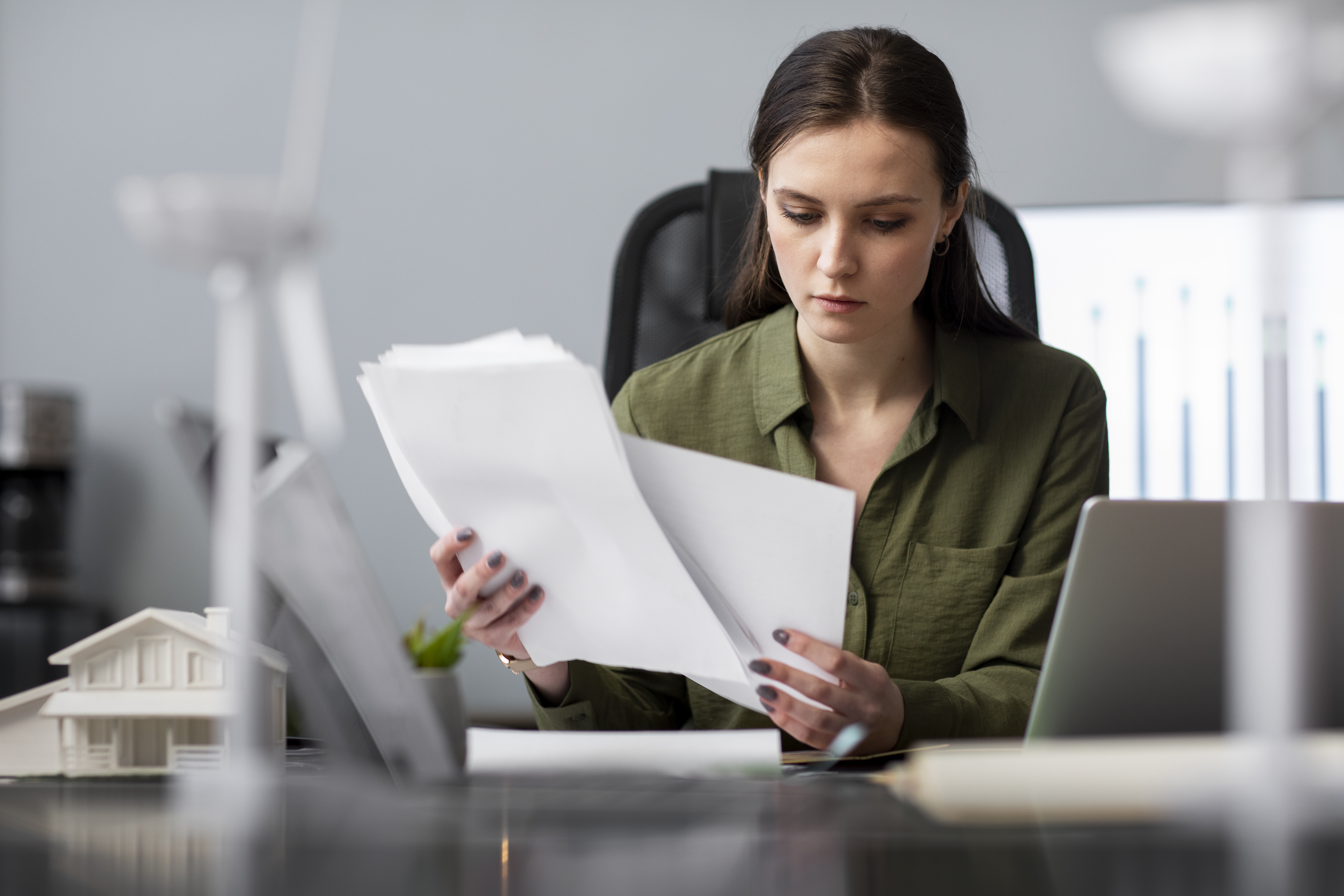 Seller reviewing HOA notices before listing a property. Seller reviewing HOA notices before listing a property.
