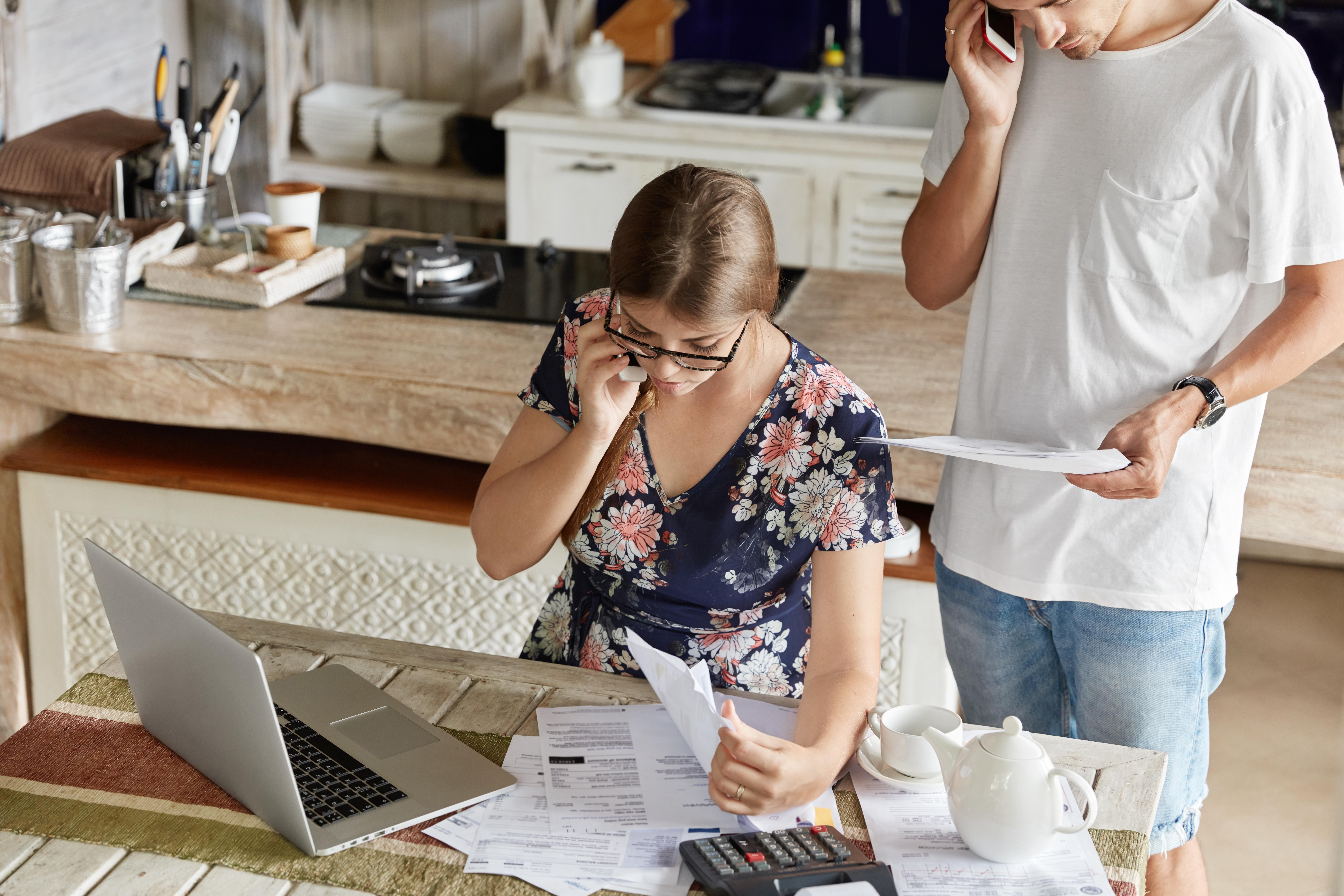 Homeowner comparing a low-interest mortgage with today's higher mortgage rates.