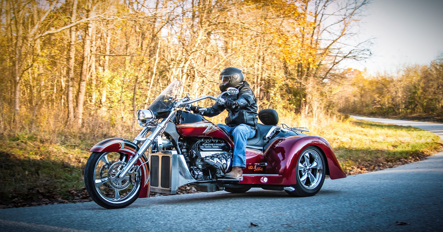 Challenger Spirit V8 trike on an autumn backroad