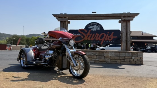 Challenger trike at the Sturgis sign