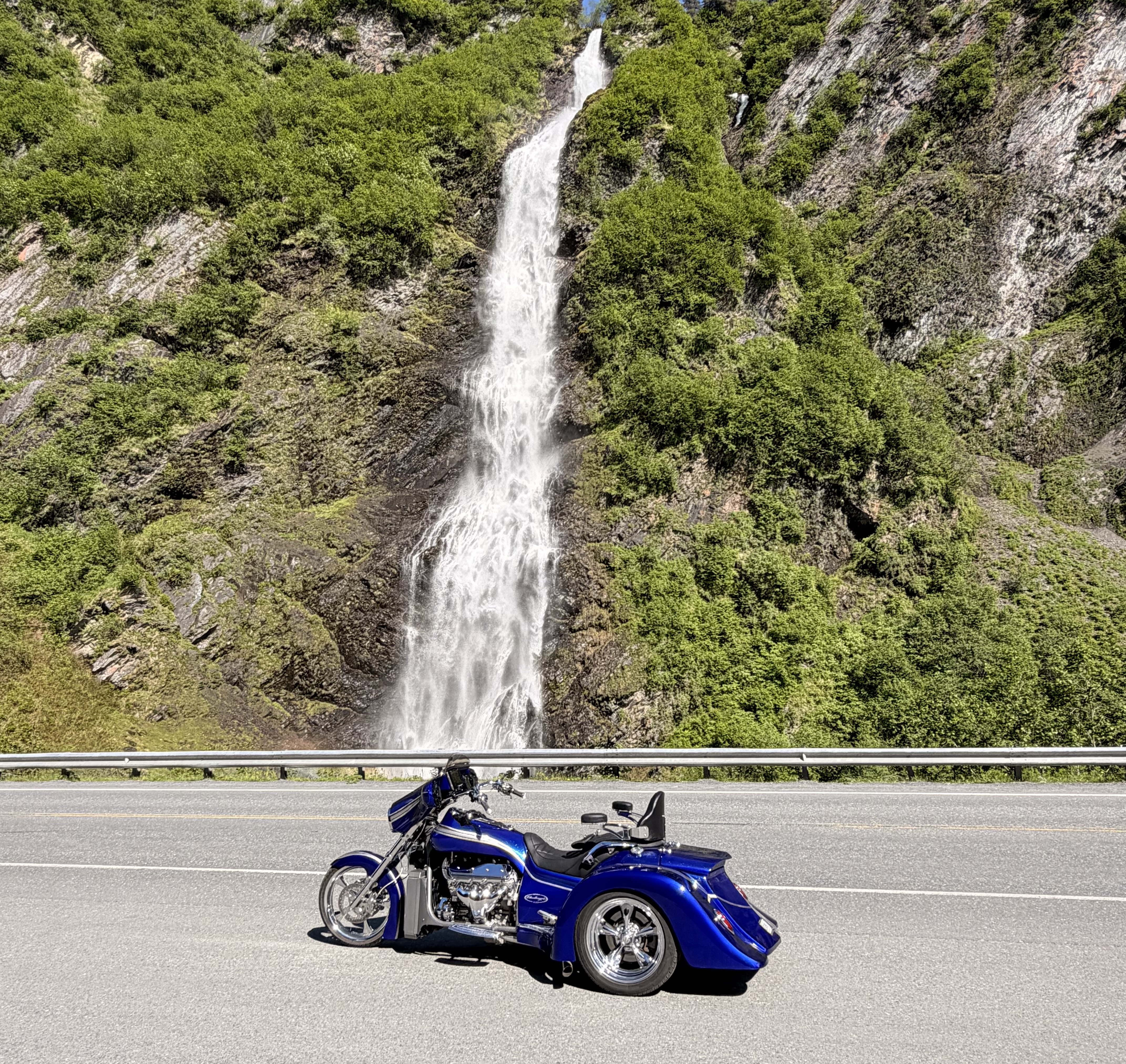 Challenger trike beside an Alaska waterfall