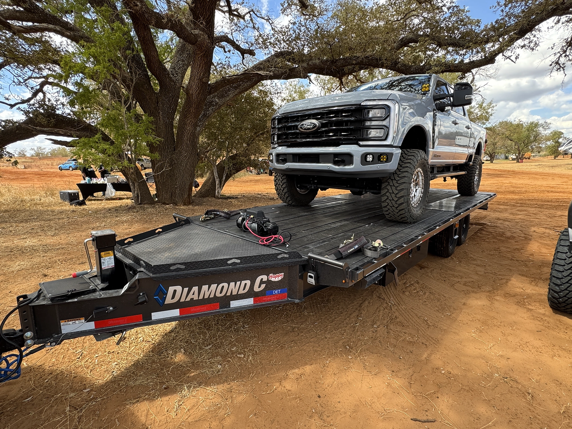 102 inch by 24 foot HD deckover tilt trailer Diamond C