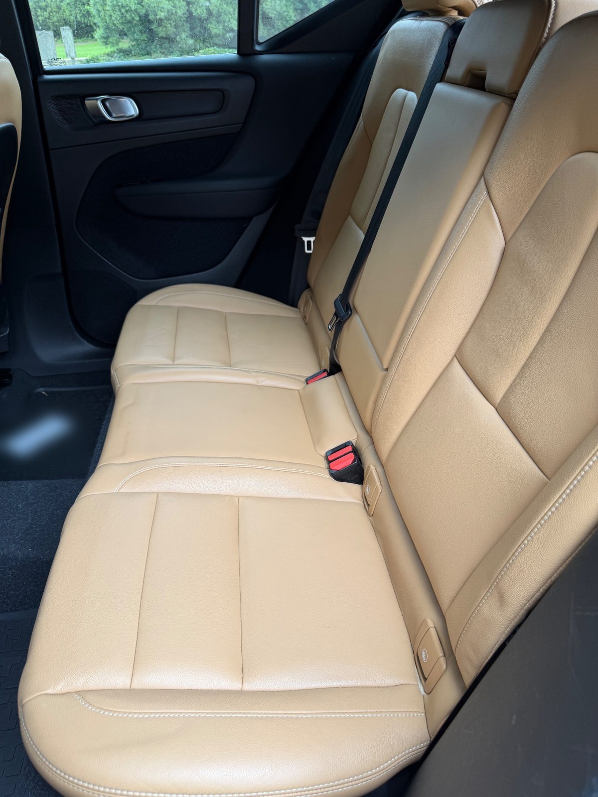 Rear bench seat of a Volvo XC40 before detailing
