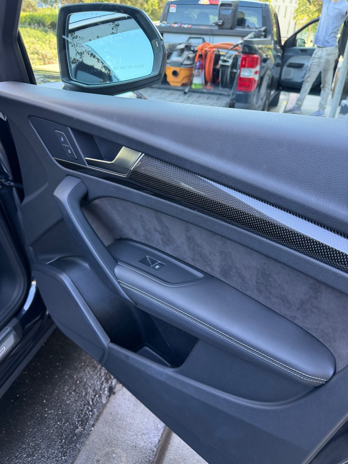 Clean rear door card of an Audi SQ5 after detailing