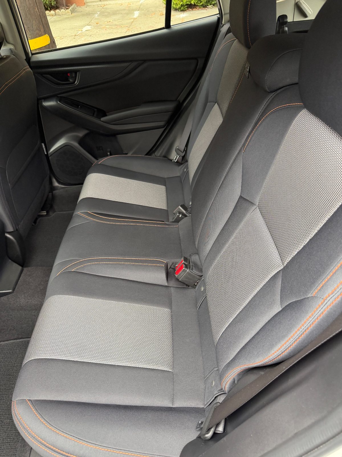 Rear bench of a white Subaru Crosstrek in the Inner Richmond, San Francisco, after detailing