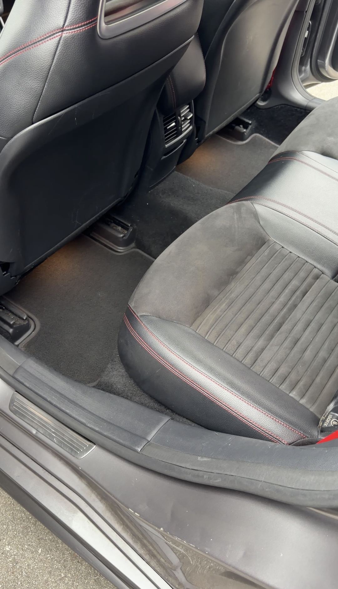 Rear footwell and sill of a Mercedes-Benz CLA250 before interior detailing