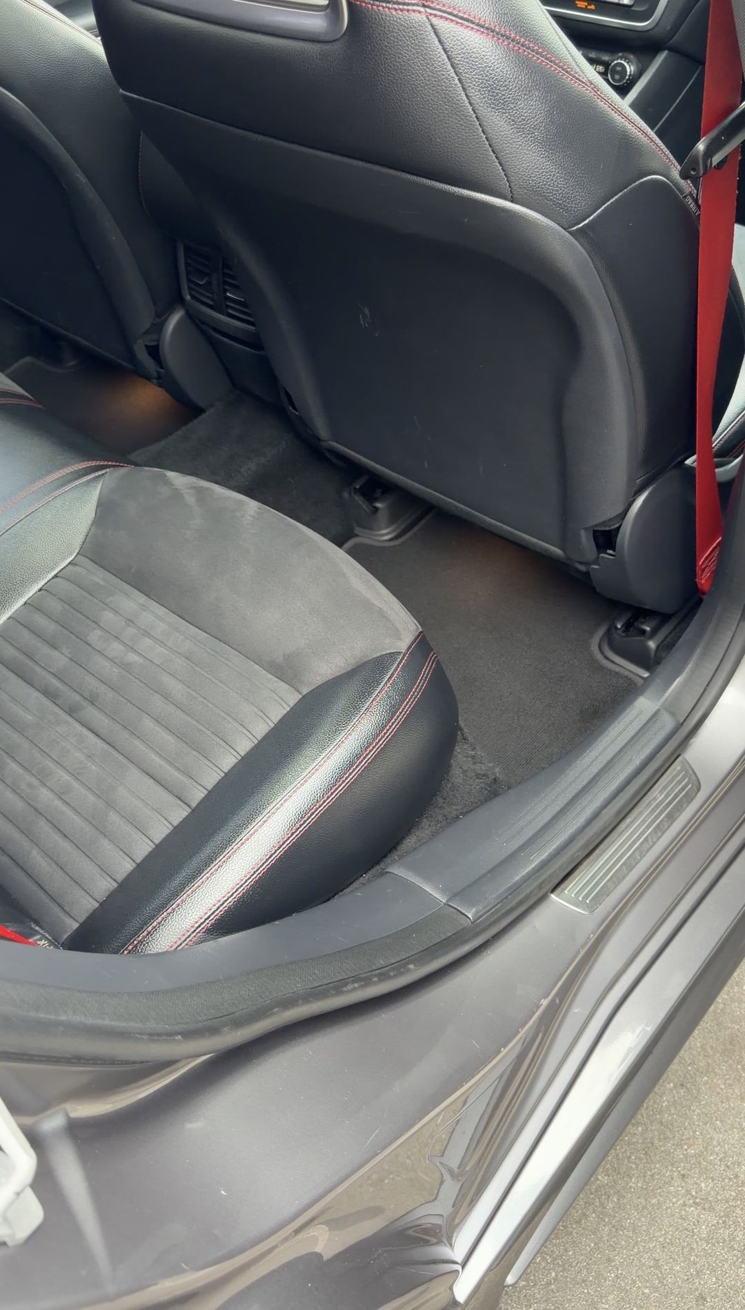 Cleaned rear footwell and rear seat of a Mercedes-Benz CLA250 after interior detailing