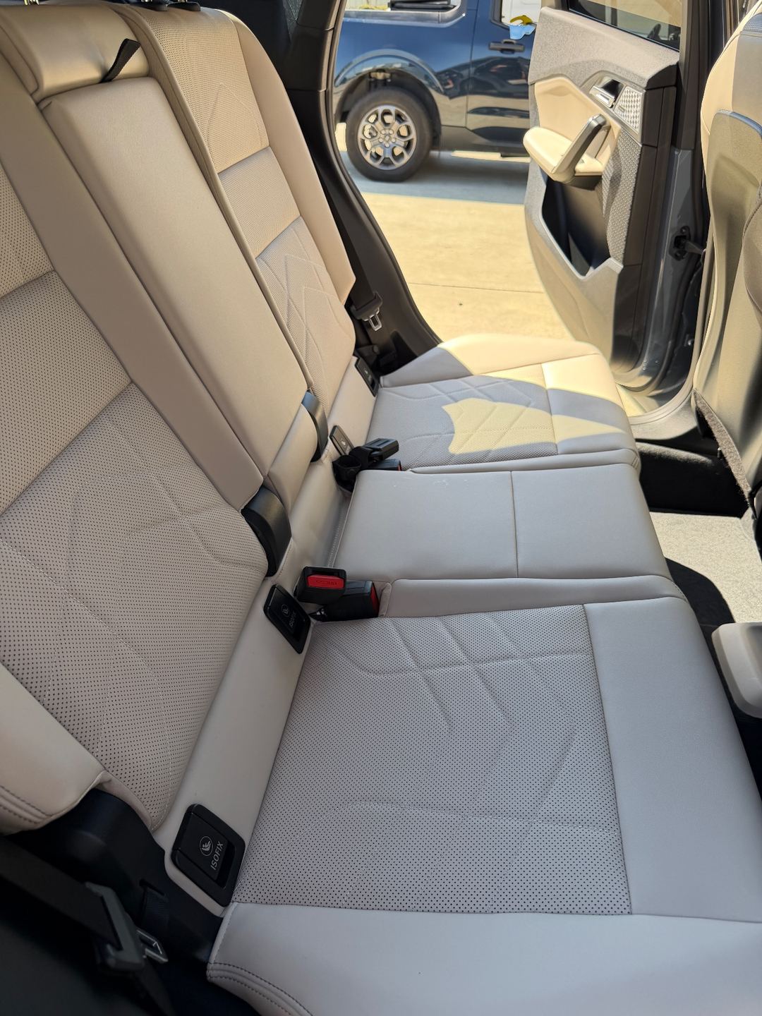 Rear bench seat of a BMW X1 after interior cleaning