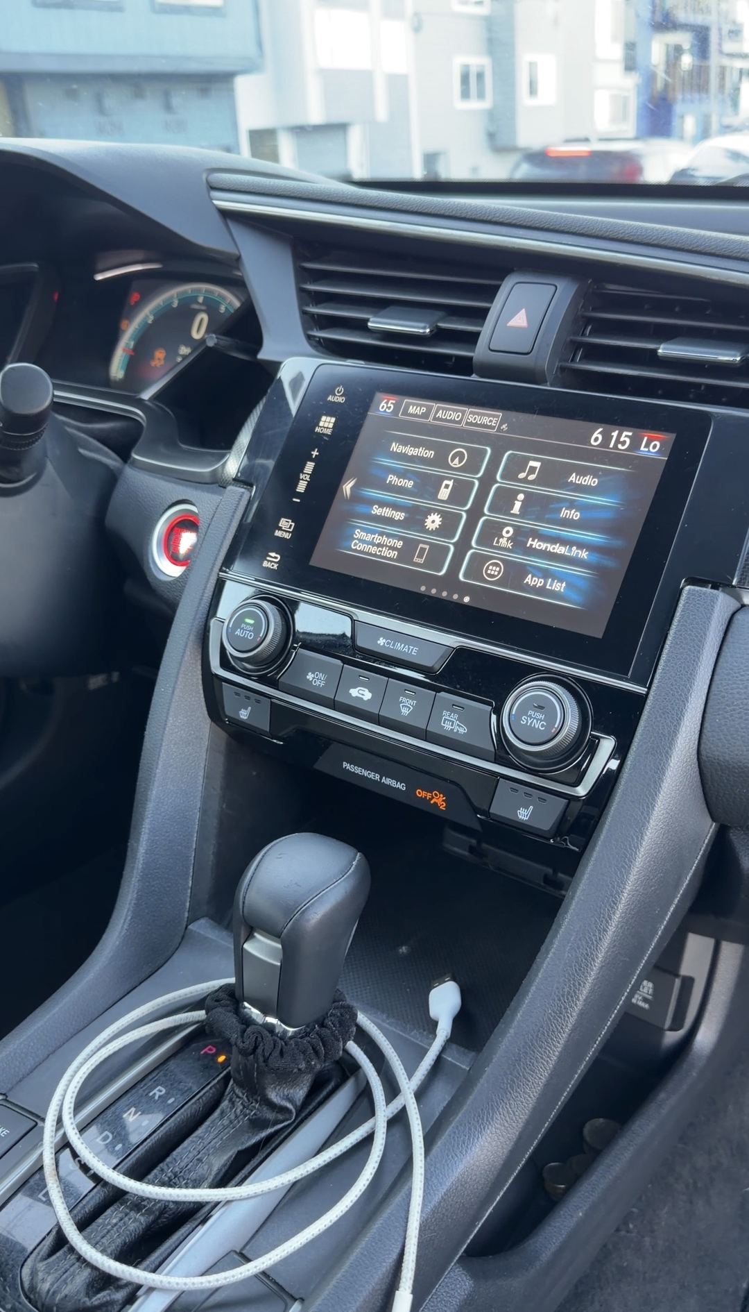Cleaned centre stack of a 10th-generation Honda Civic with the Display Audio home menu on screen