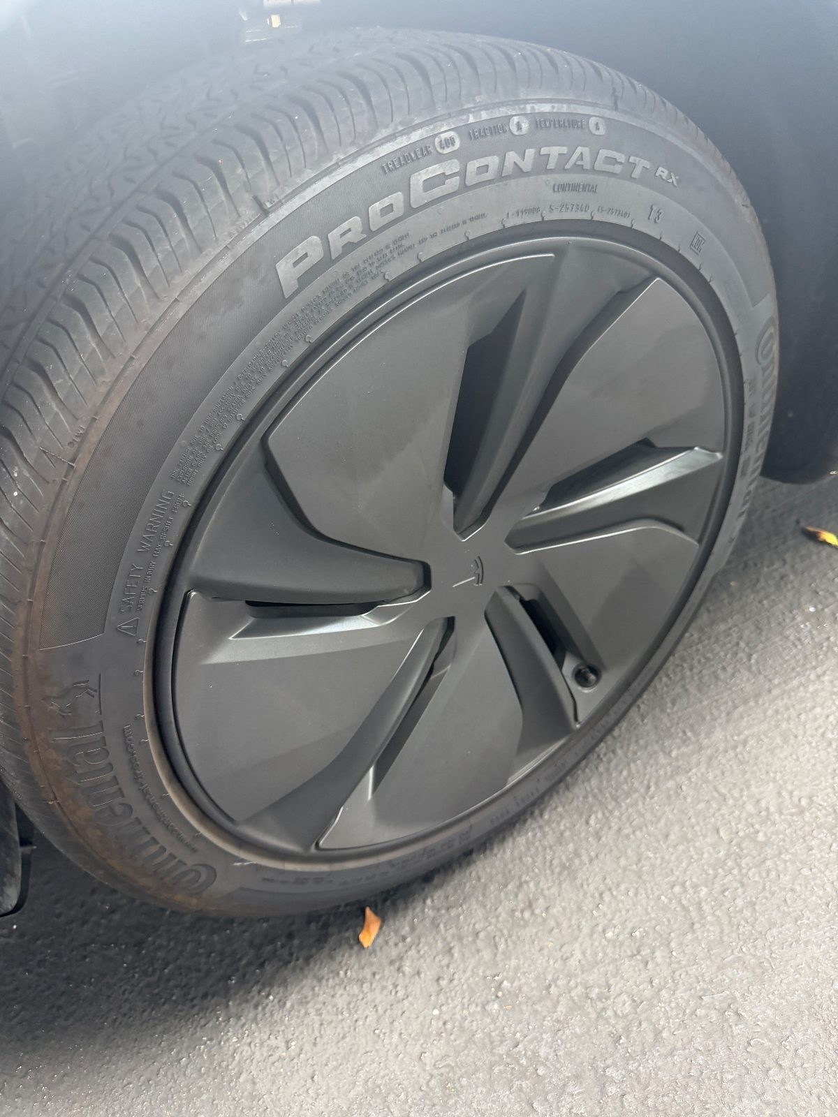 Blue Tesla Model Y wheel and tyre before exterior detail, Downtown San Francisco