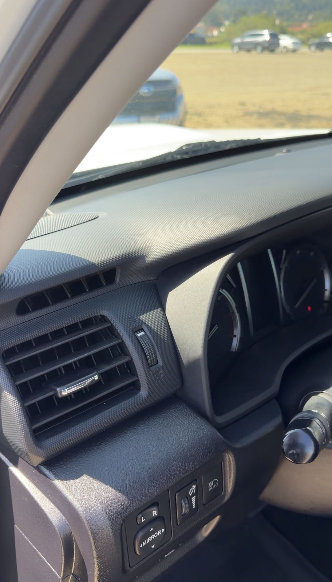 Clean dashboard air vent and instrument cluster of a Toyota 4Runner