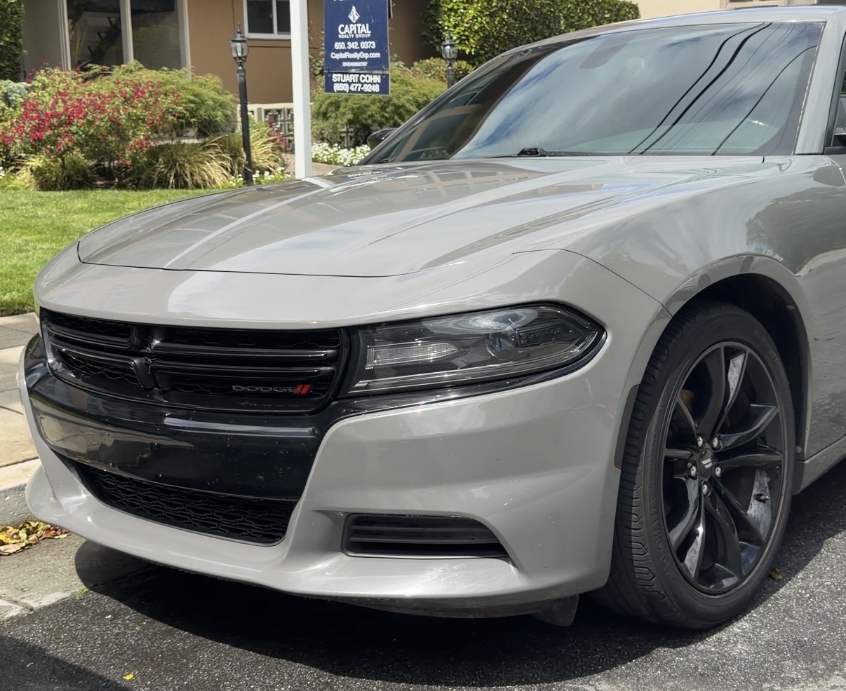 After exterior detailing — clean front end of a gray Dodge Charger with decontaminated paint and clean wheels by SF City Wash