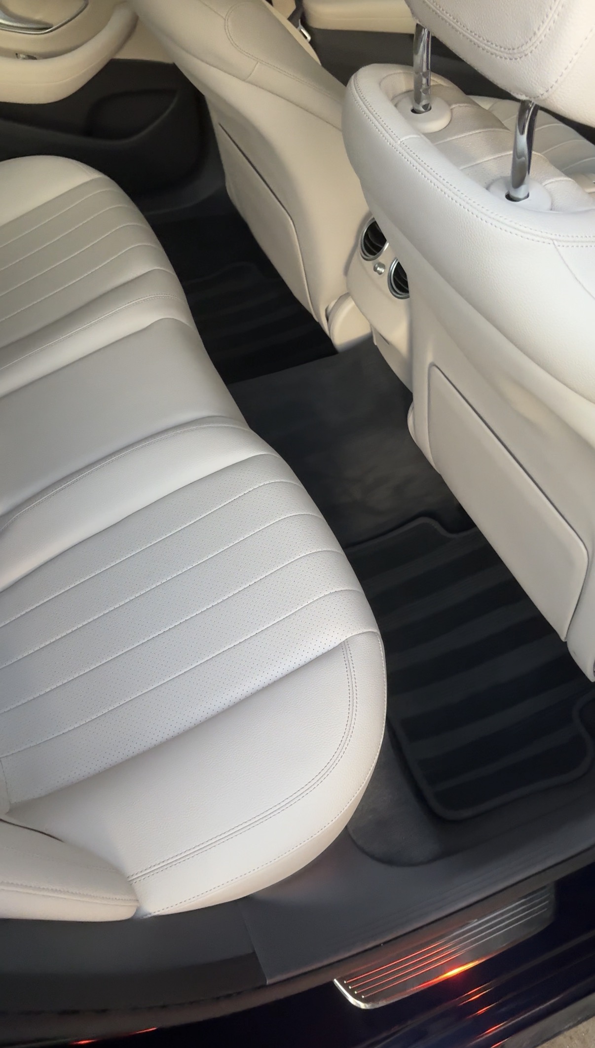 After passenger rear floor of a Mercedes E300, interior detail in Pacific Heights