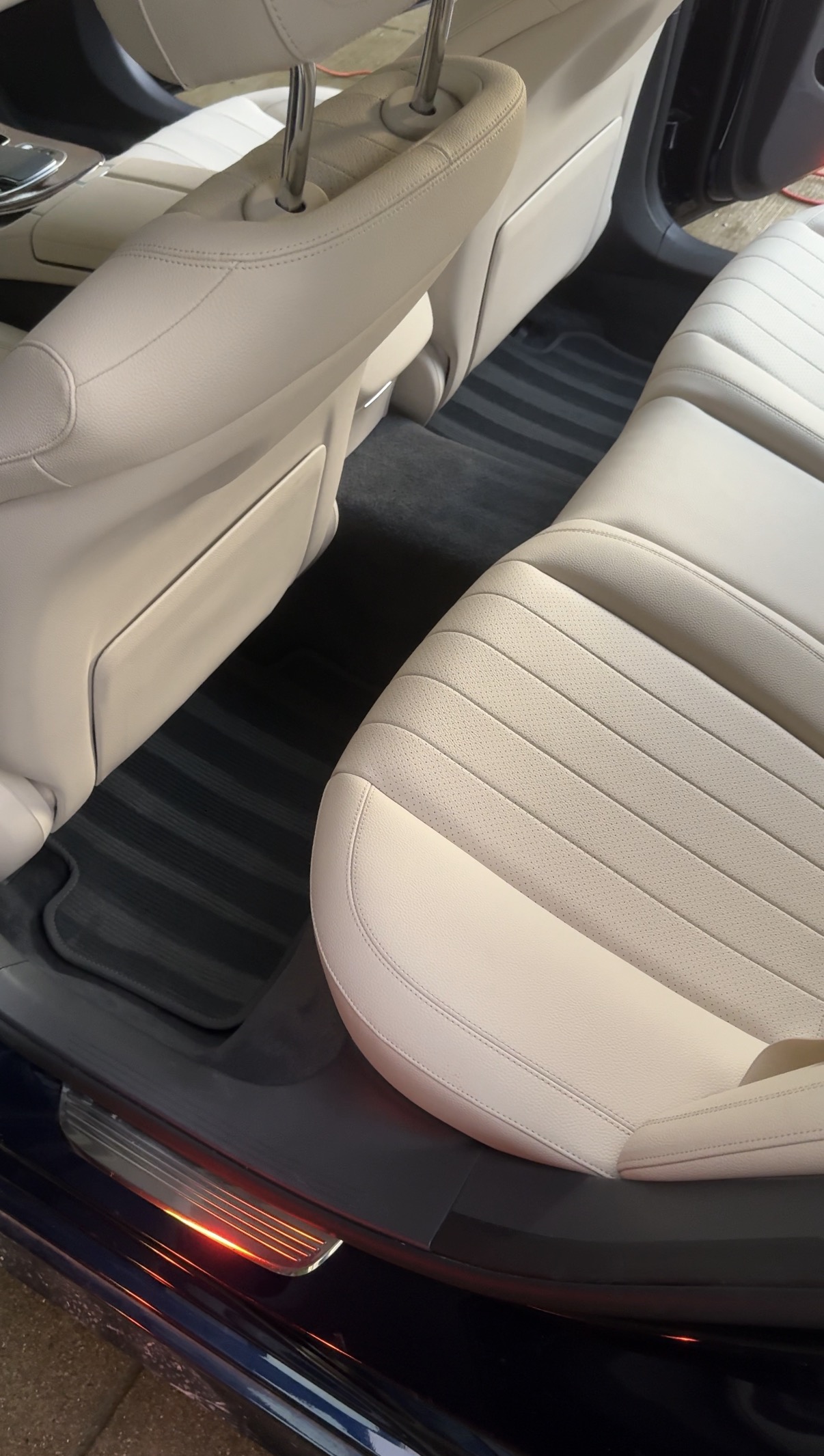 After driver rear floor of a Mercedes E300, interior detail in Pacific Heights