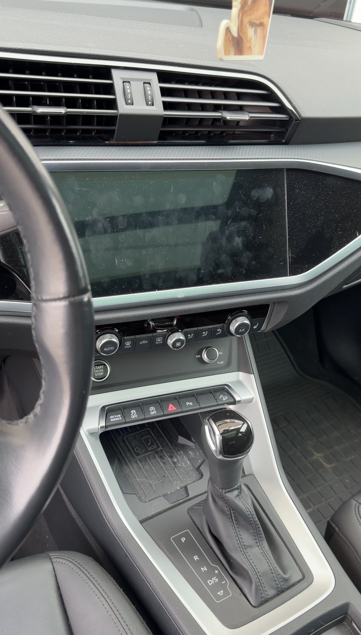 After media controls, alt of a Audi Q3, interior detail in Marina District