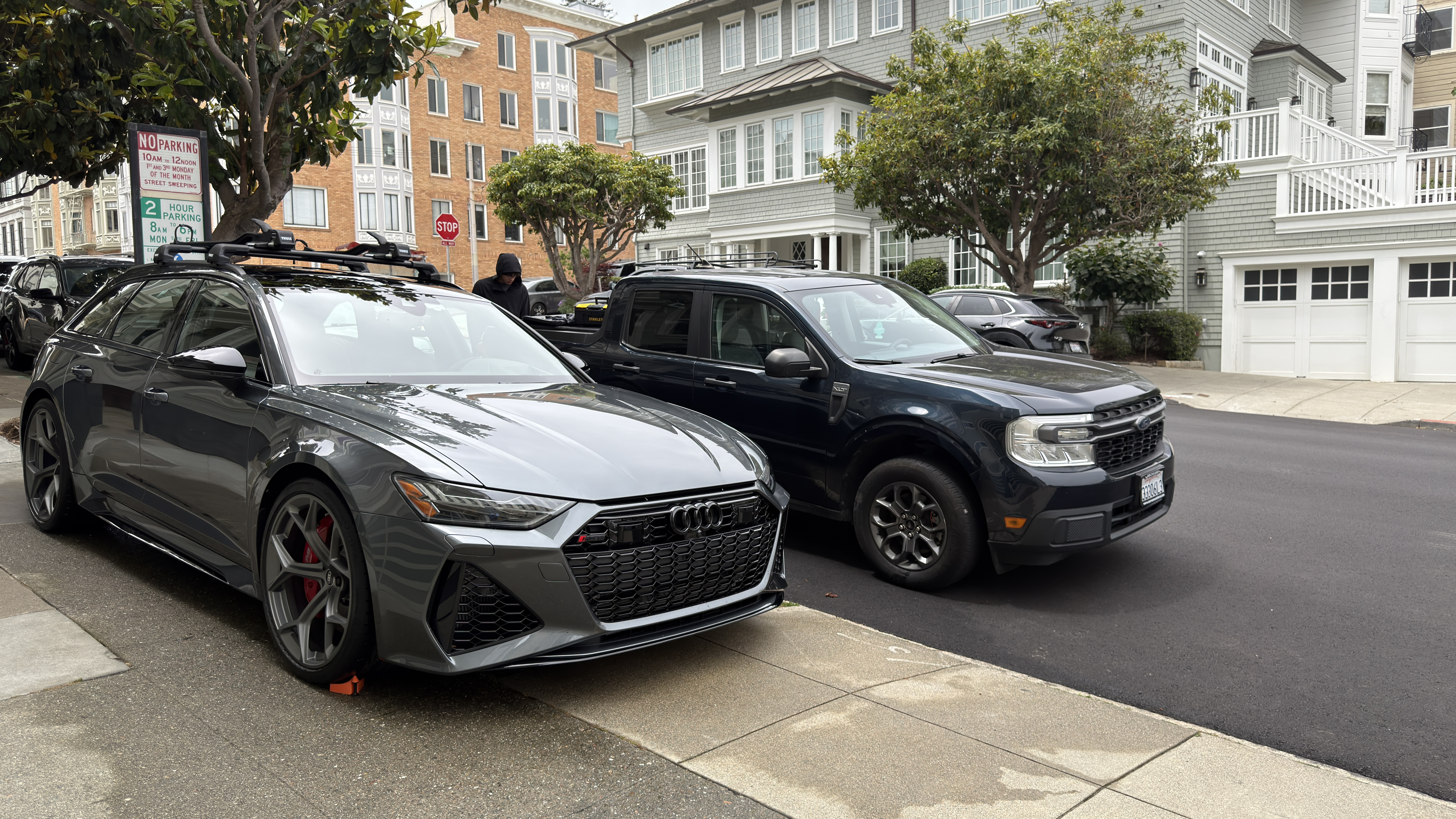 SF City Wash detail truck parked next to a 2026 Audi RS6 in Cow Hollow, San Francisco before a full detail service