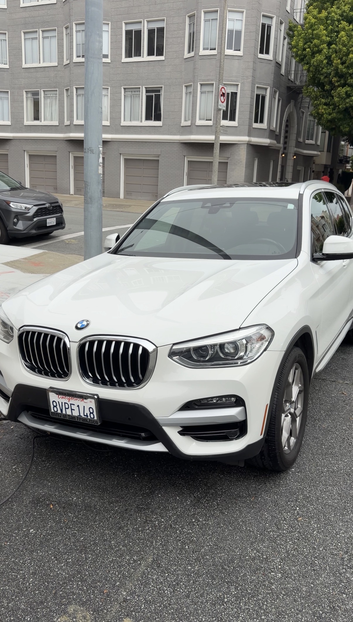 BMW X3 after exterior detail in the Marina District, San Francisco — hand wash, decontamination, and wheel cleaning
