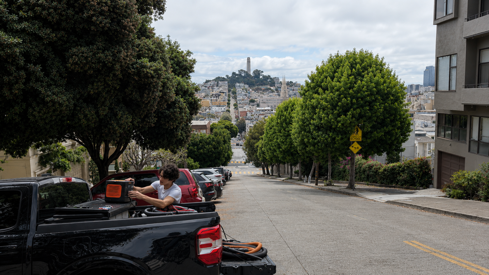 SF City Wash mobile detailing setup on a San Francisco hill with Coit Tower visible in the background — serving Pacific Heights, Cow Hollow, Marina District, and North Beach