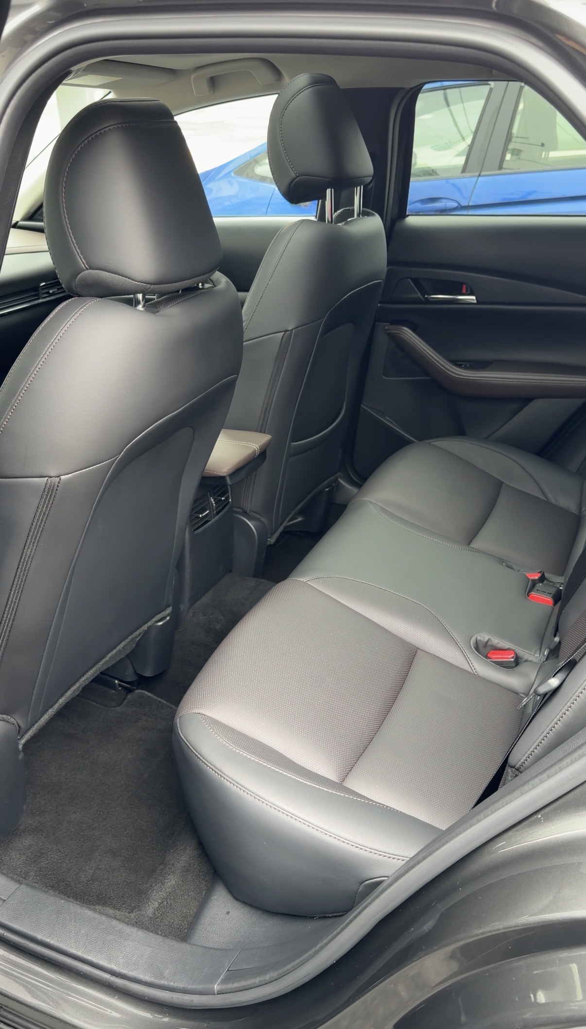 Mazda CX-30 rear seat after detailing, clean carpet