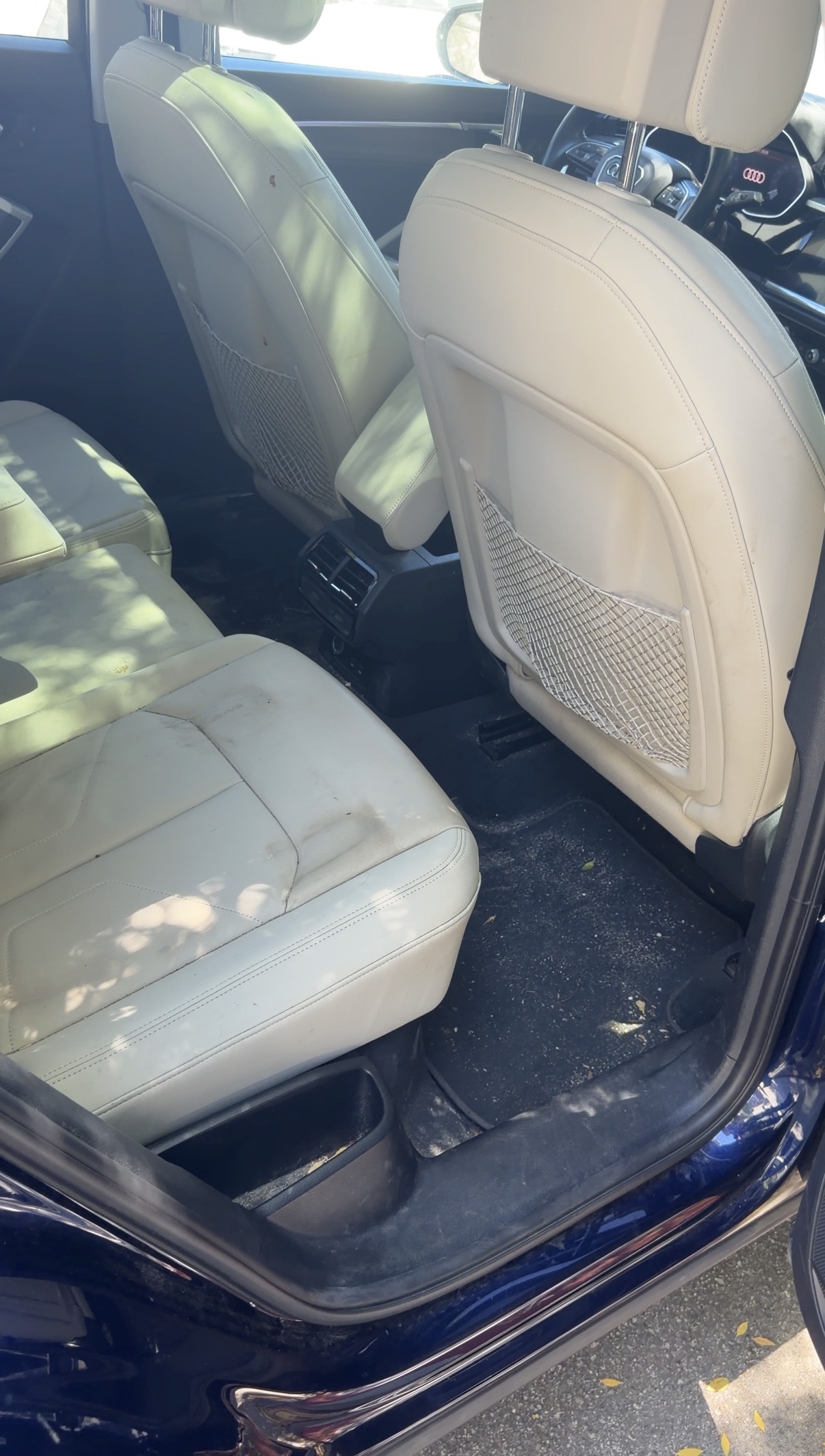 Audi Q3 rear seat before detailing, stained