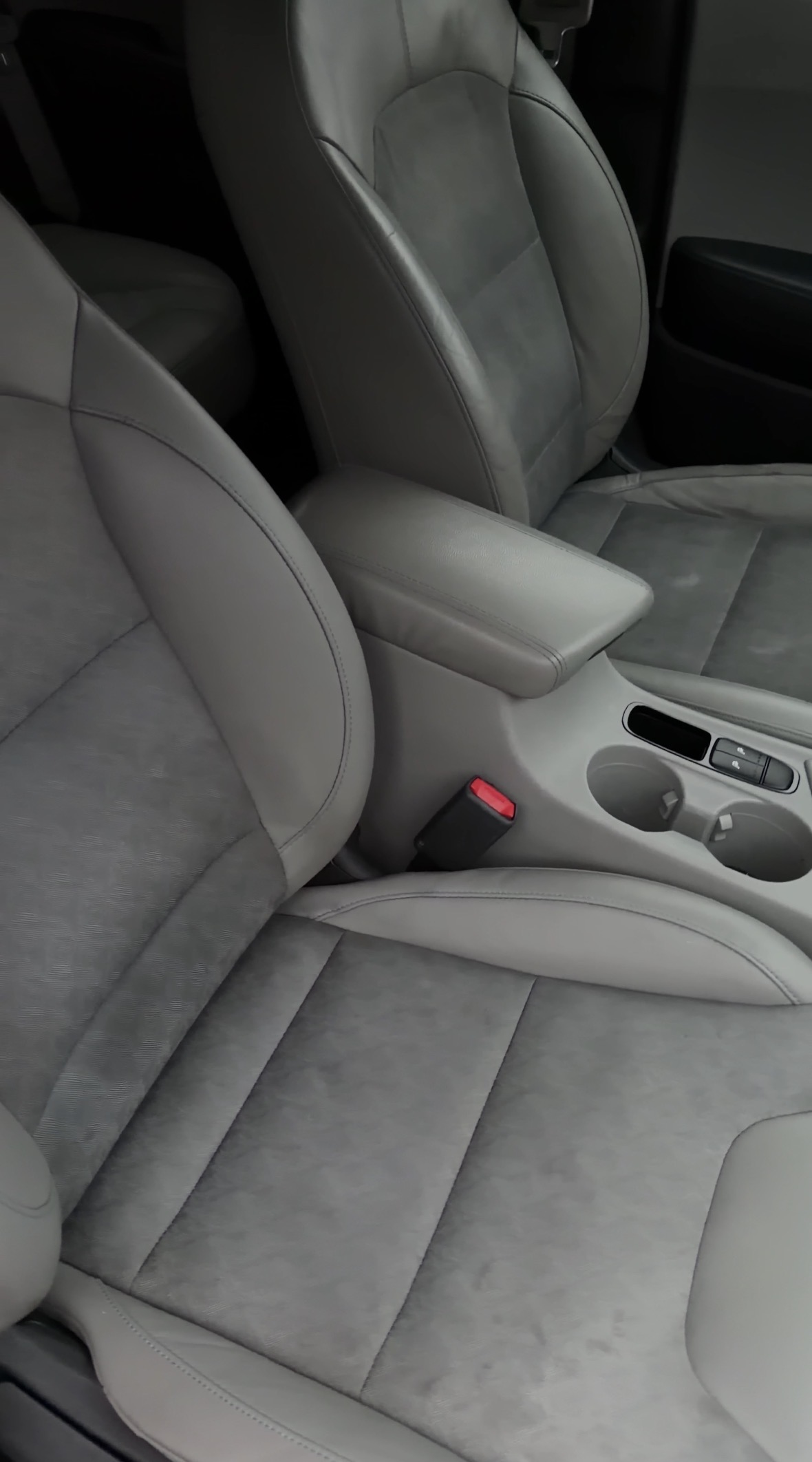Kia Niro passenger seat and center console after detailing, clean upholstery and console