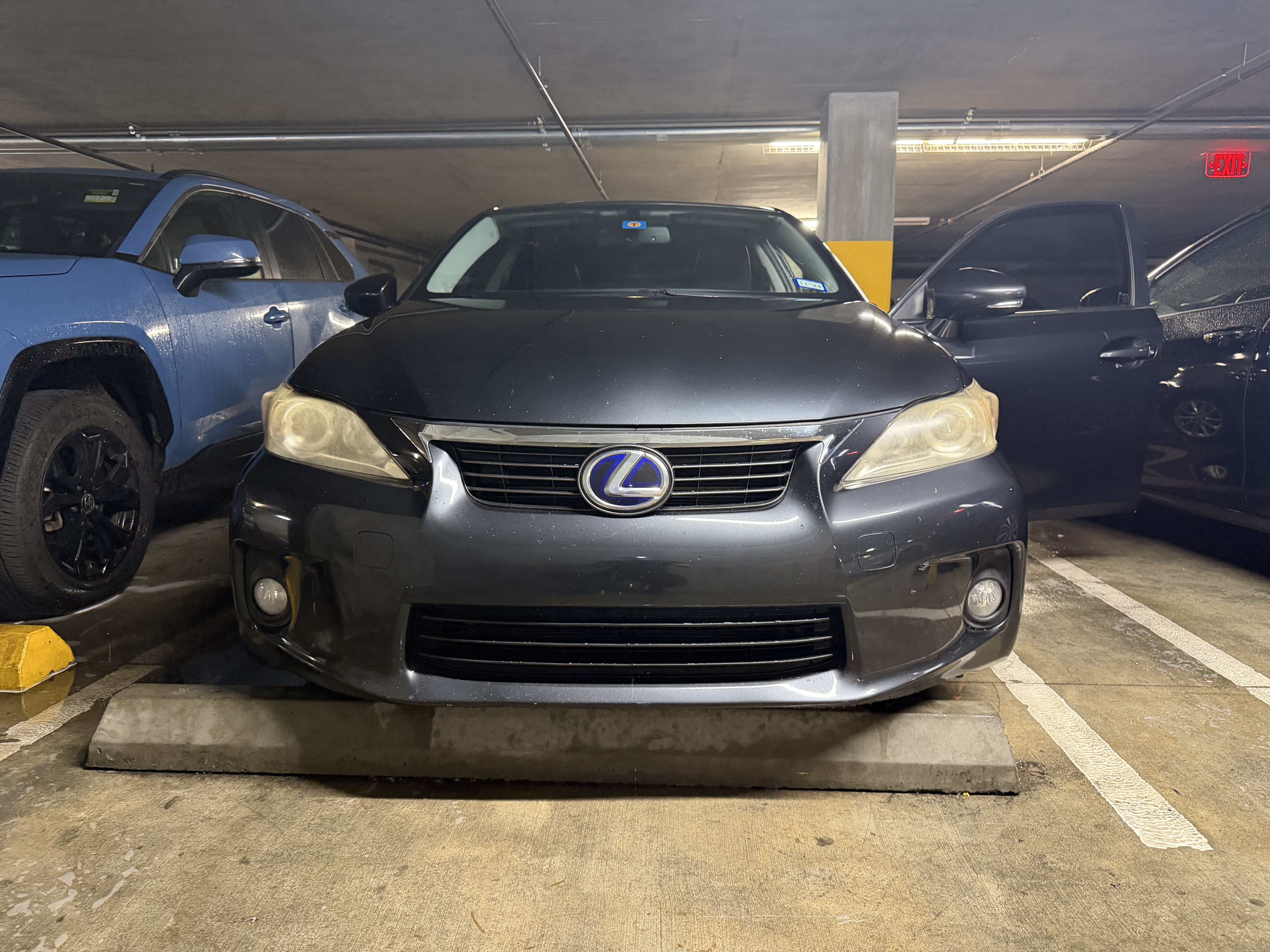 Lexus CT200h in a Mission Bay garage before mobile detail