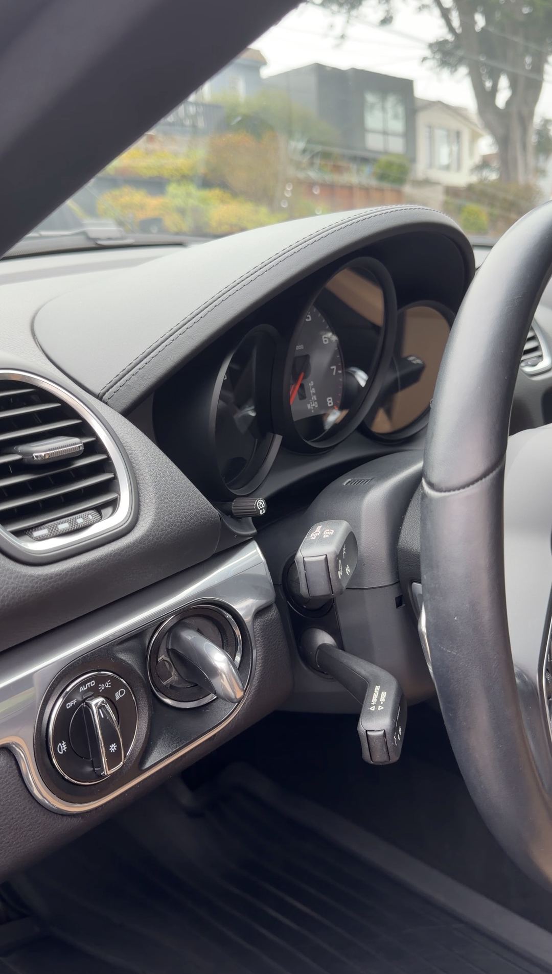 Clean instrument cluster and dash of a Porsche 718 Cayman S after an interior detail.