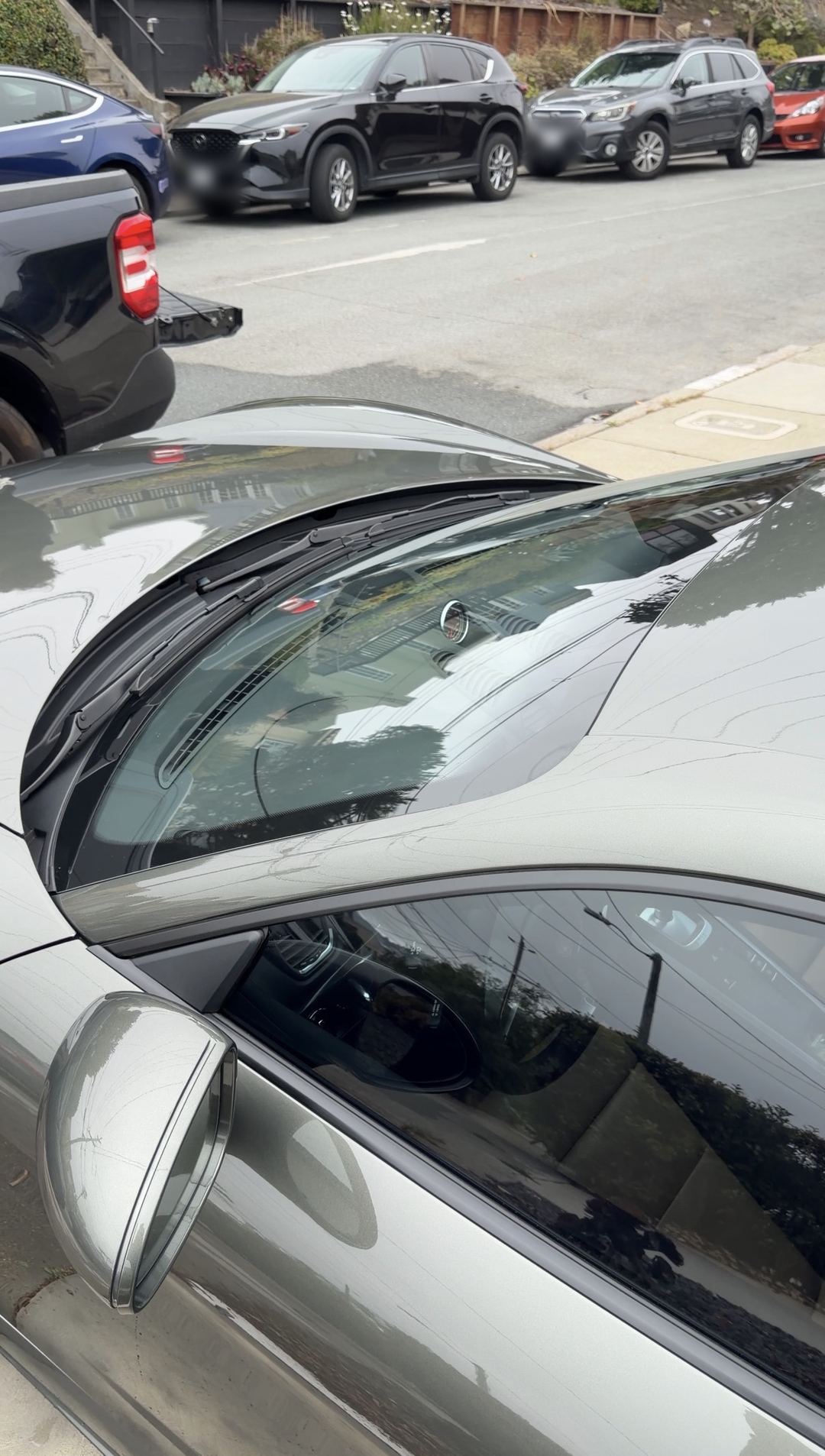 Clean windscreen, cowl and roof of a Porsche 718 Cayman S after a mobile detail.