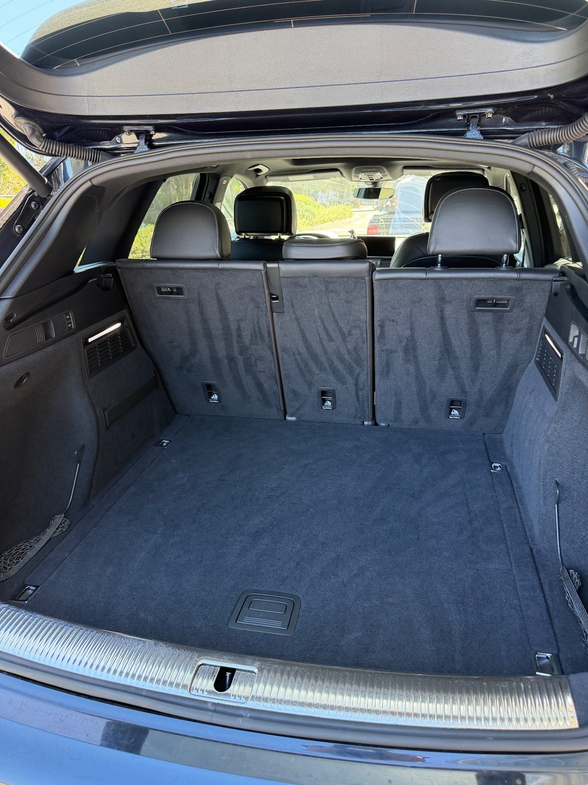 Clean, vacuumed cargo area of an Audi SQ5 after detailing