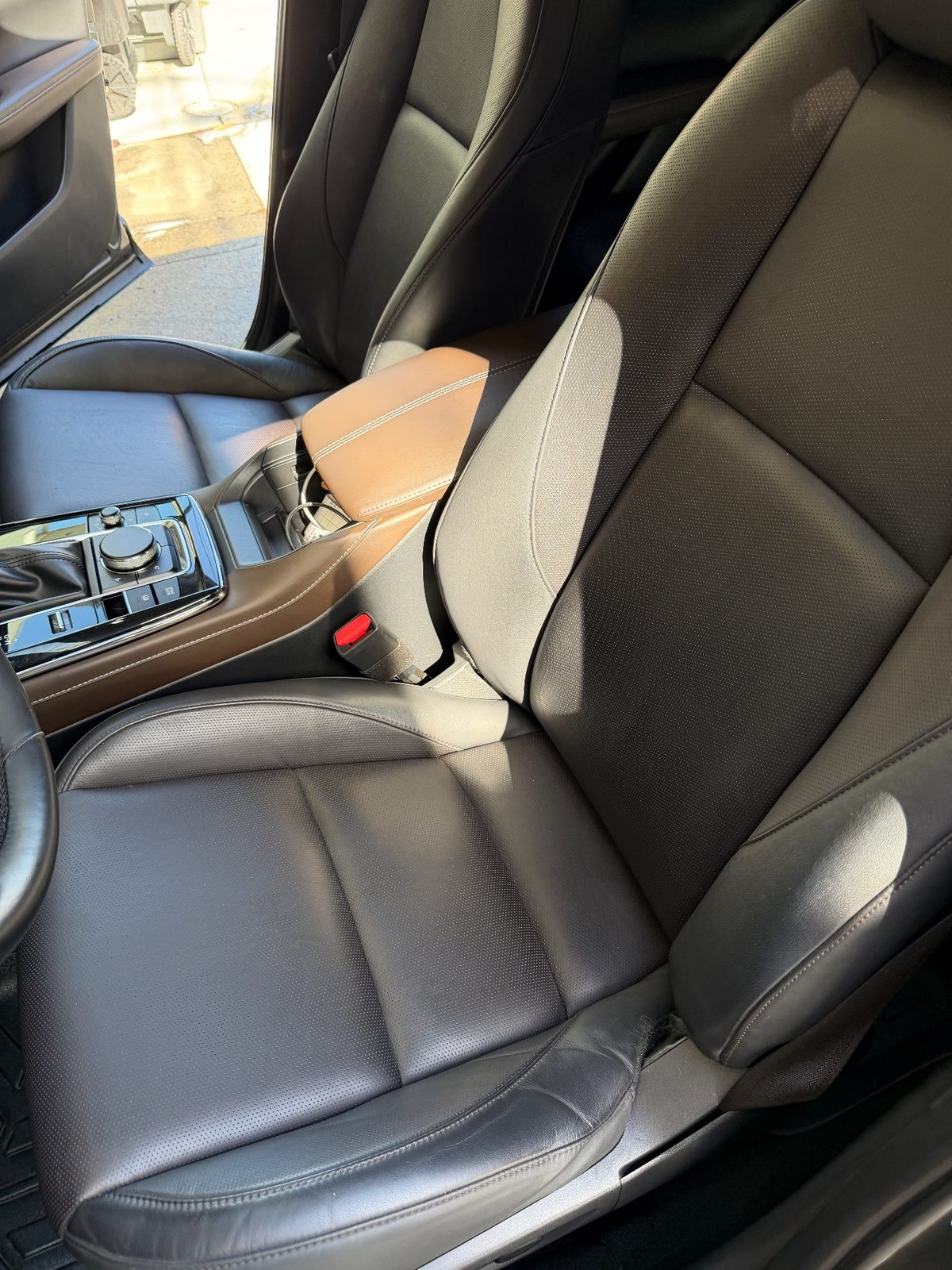Front seats of a grey Mazda CX-30 after detailing