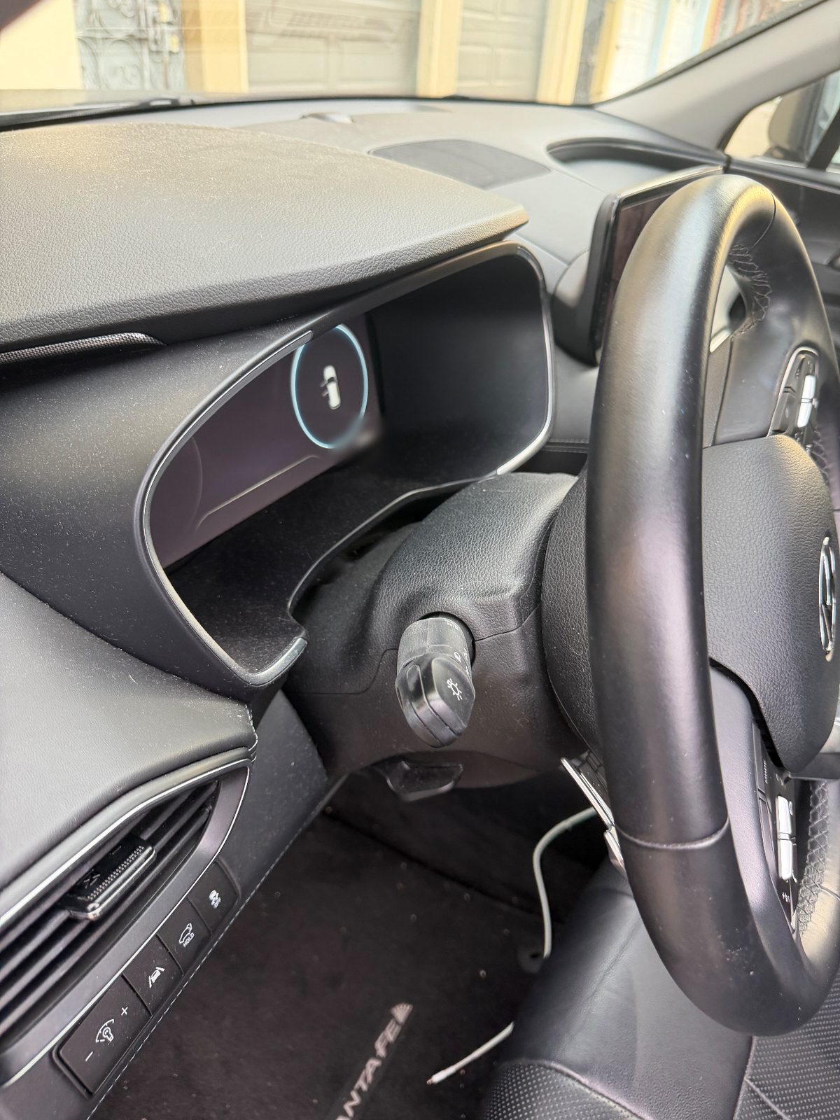 Dusty dash top and instrument cluster of a Hyundai Santa Fe before detailing