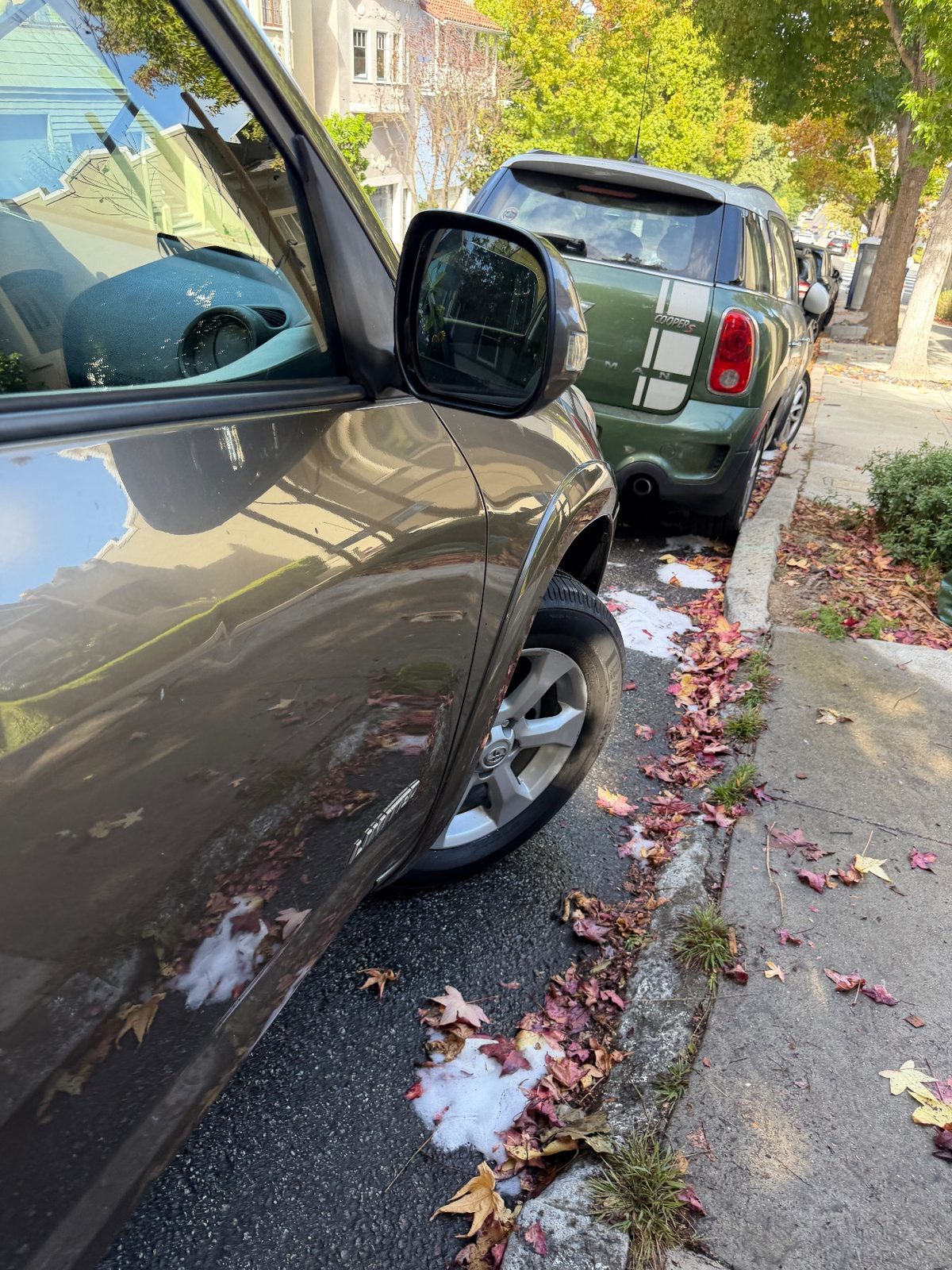 Clean door and fender of a 2011 Toyota RAV4 Limited after washing