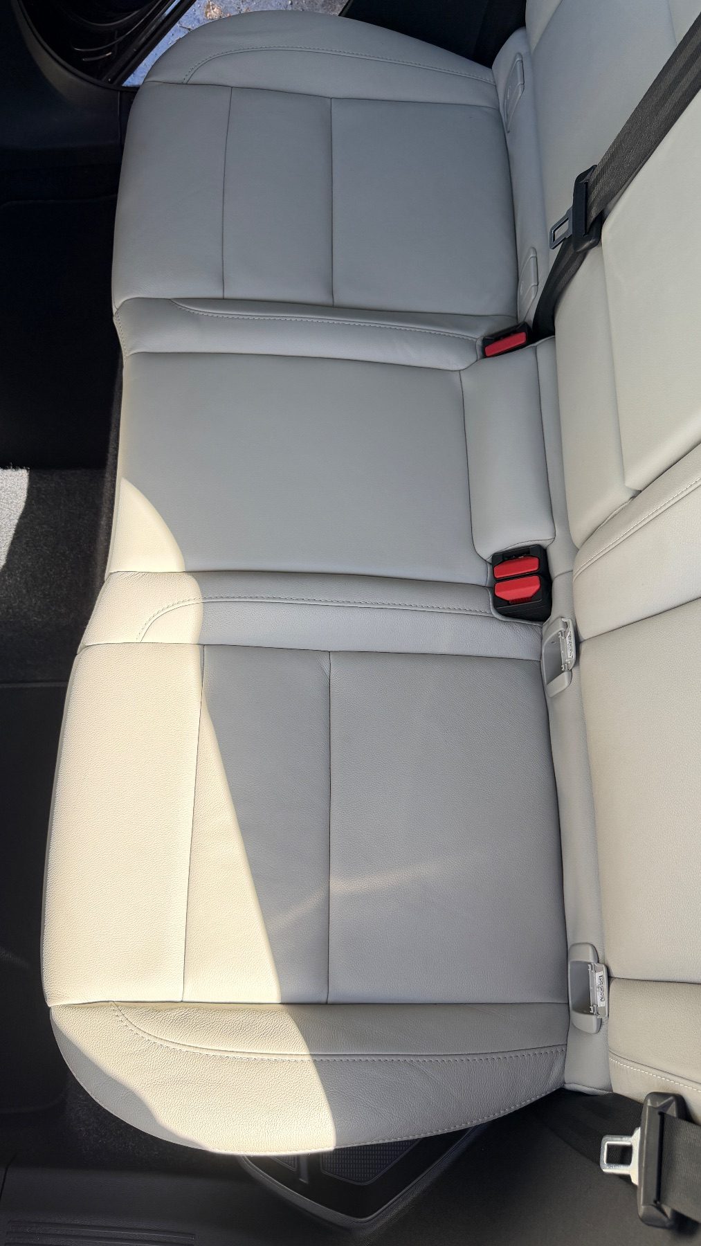 Top-down view of a Volvo XC40 rear bench after detailing, with clean uniform leather