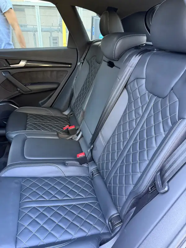 Clean quilted leather rear seat in an Audi SQ5 after detailing