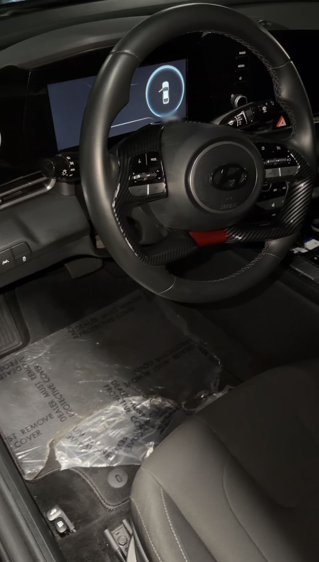 Driver seat and steering wheel of a Hyundai Elantra after interior cleaning