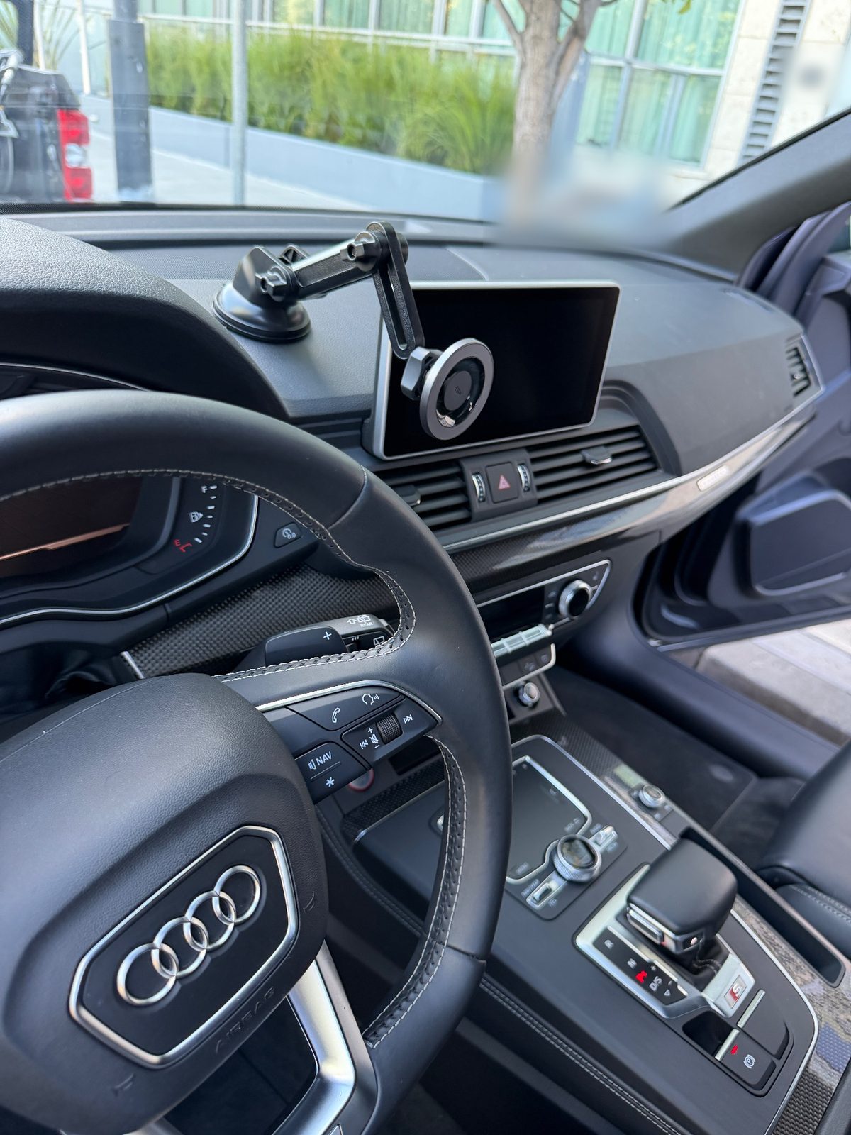 Clean dashboard and steering wheel of an Audi SQ5 after detailing