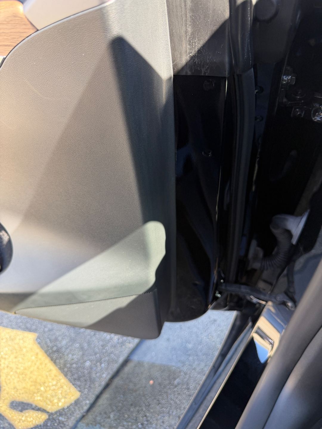 Clean door jamb of a Tesla Model Y after detailing