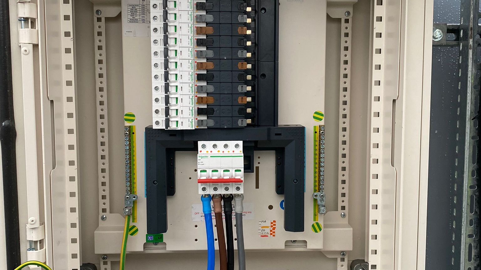 Open electrical distribution panel showing MCBs and RCDs inside a consumer unit Open electrical distribution panel showing MCBs and RCDs inside a consumer unit