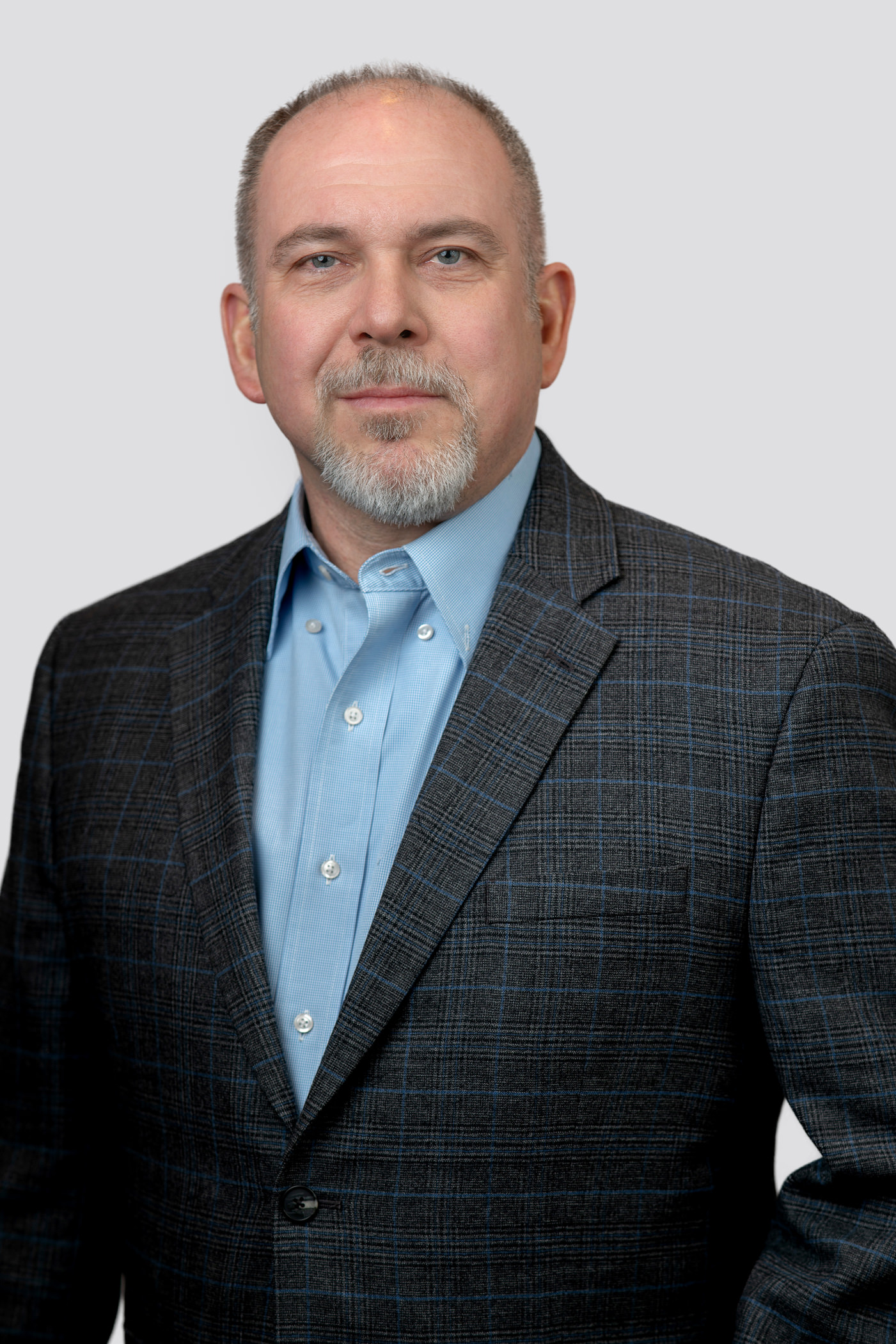 Author and business leader in studio portrait