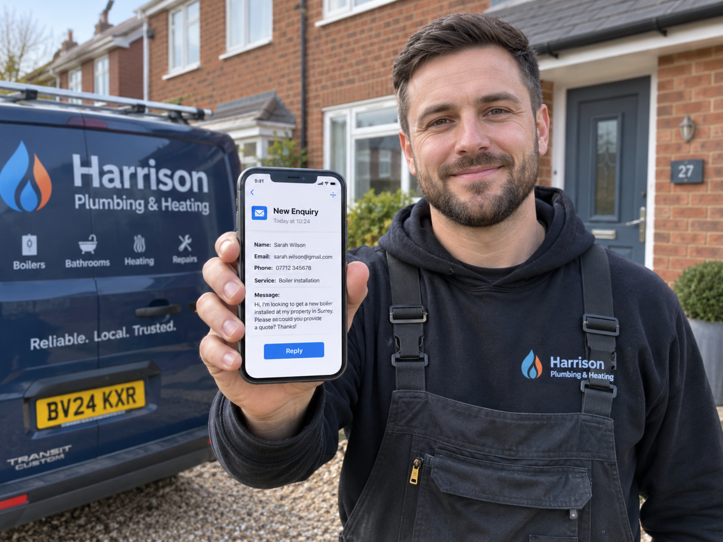 UK plumber holding a phone showing a new customer enquiry outside a residential property UK plumber holding a phone showing a new customer enquiry outside a residential property